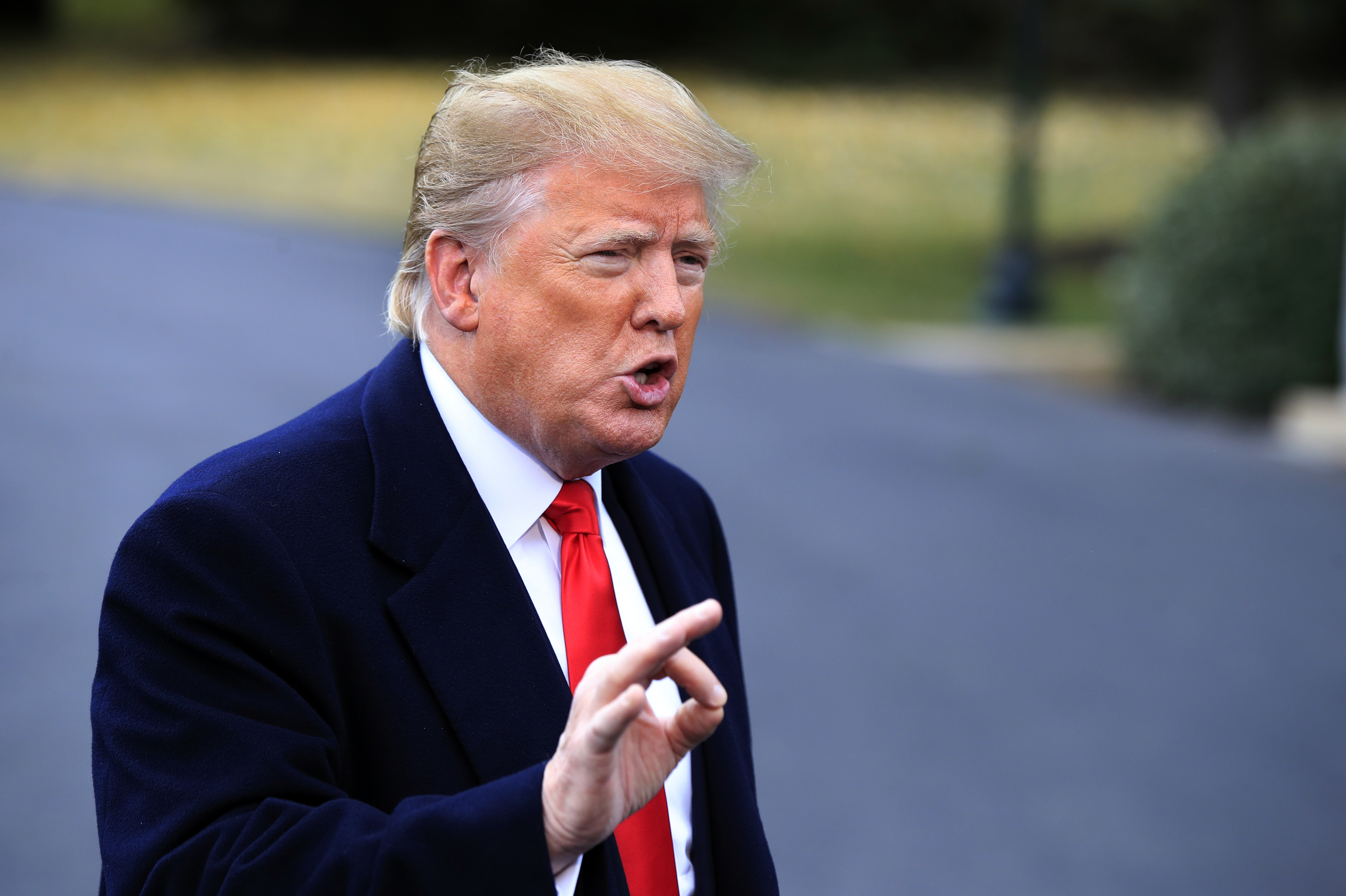 The Latest: Trump hails Ind. Senate candidate as 'a fighter'