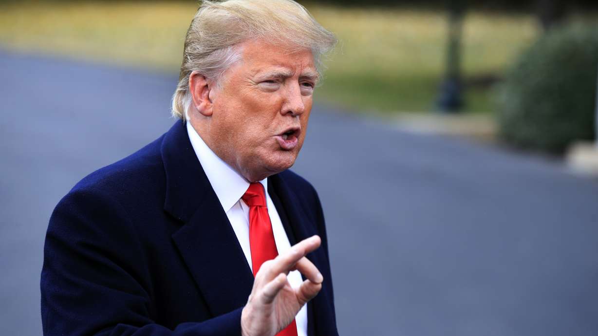 The Latest: Trump hails Ind. Senate candidate as 'a fighter'