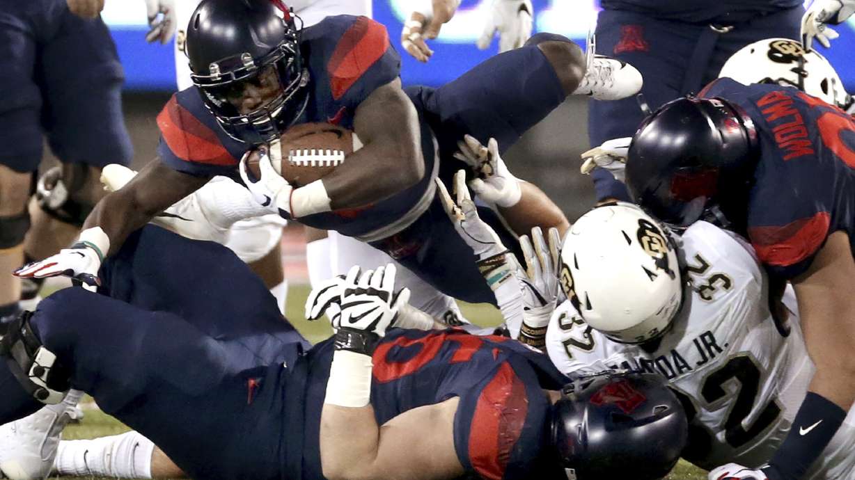 Tate's 5 TD passes lead Arizona to 42-34 win over Colorado