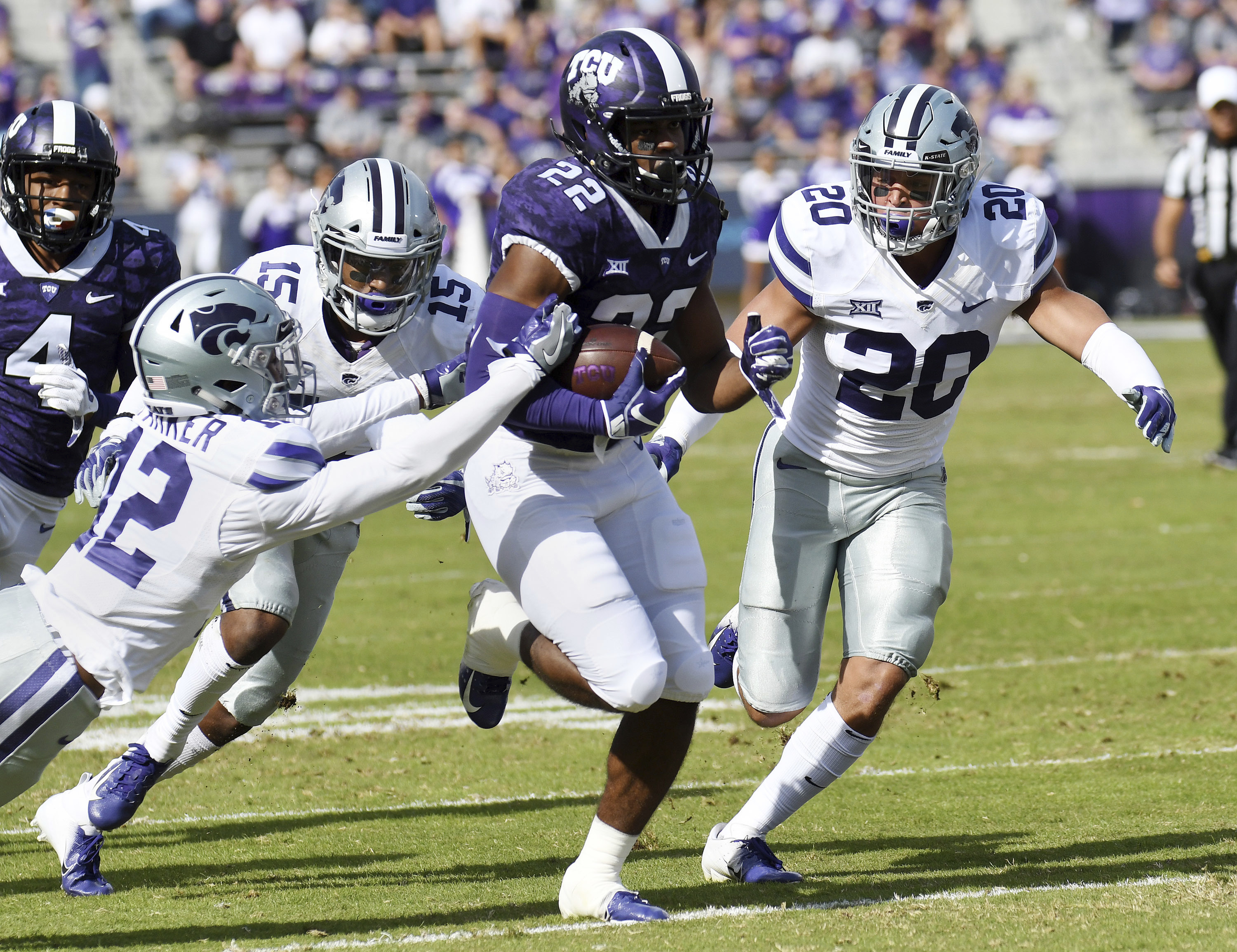TCU hangs on for 14-13 win after K-State misses tying PAT