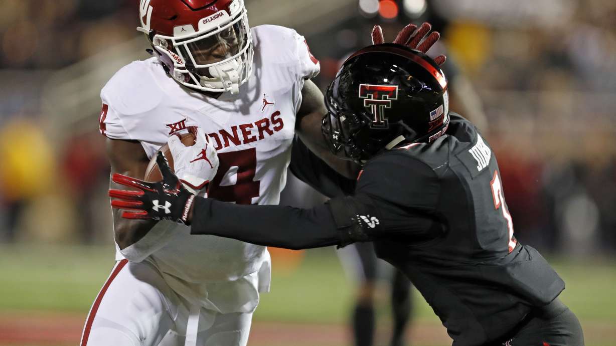 Murray recovers, rallies No. 7 OU past Texas Tech, 51-46