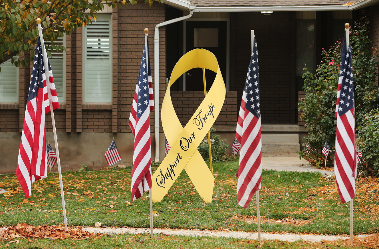 Flags fly at the home of North Ogden Mayor Brent Taylor in North Ogden on Sunday, Nov. 4, 2018. Taylor, a major in the Utah National Guard, was killed in Afghanistan on Saturday, Nov. 3, 2018. (Photo: Jeffrey D. Allred, KSL)