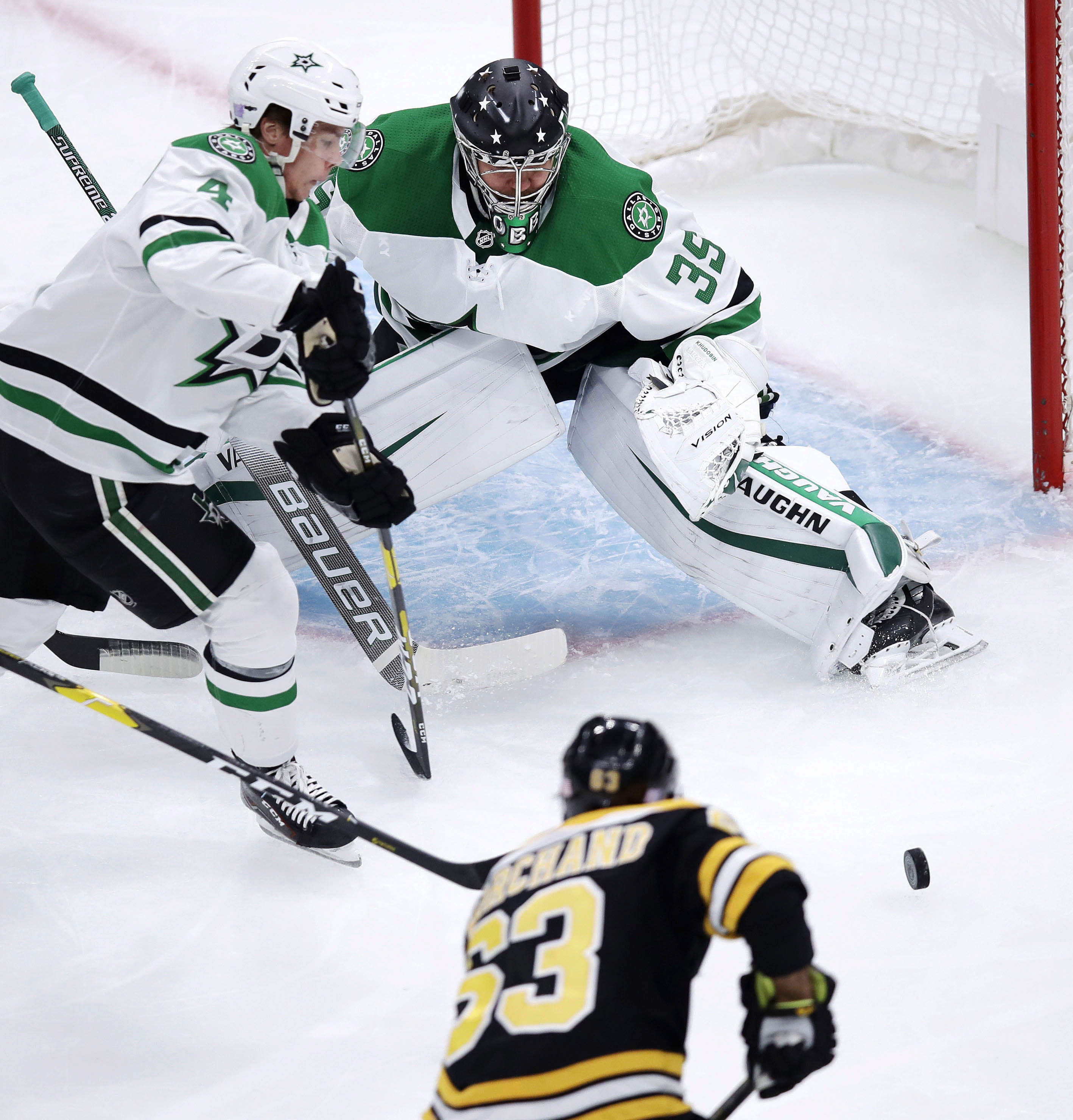 Marchand scores in OT to lift Bruins over Stars 2-1