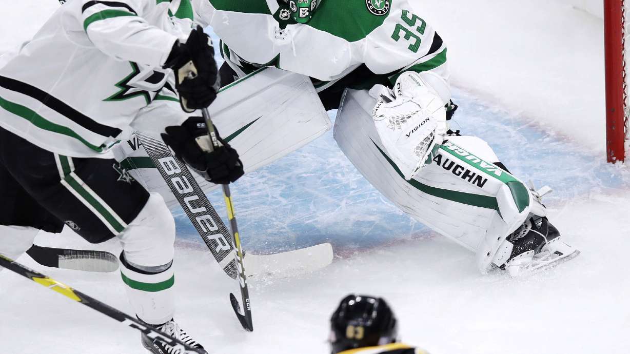 Marchand scores in OT to lift Bruins over Stars 2-1