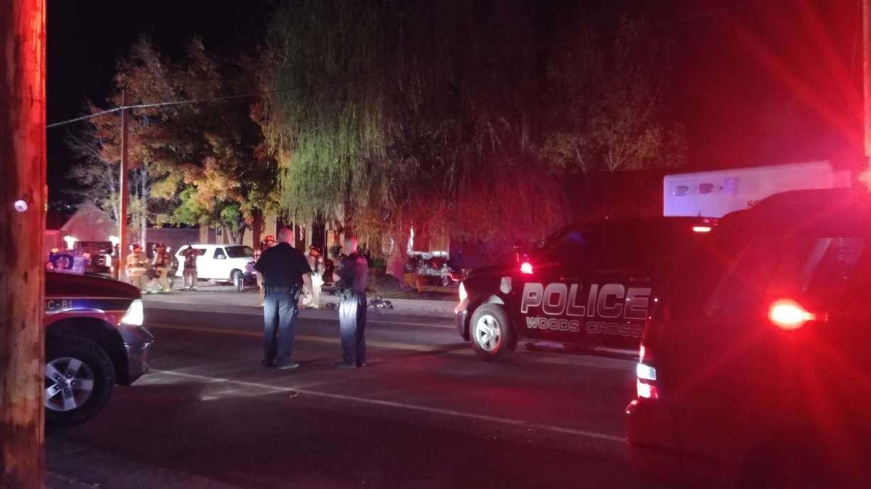 Woods Cross man pulled from burning house dies