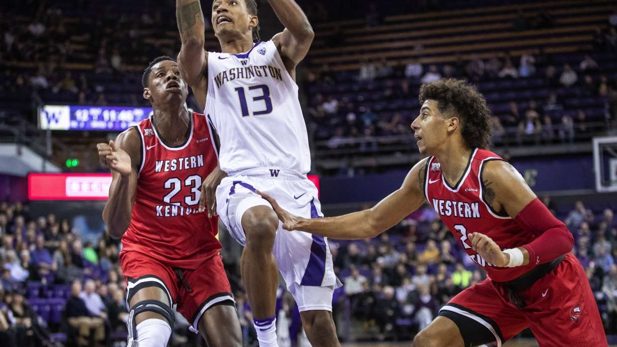 Dickerson lifts No. 25 Washington past W. Kentucky 73-55