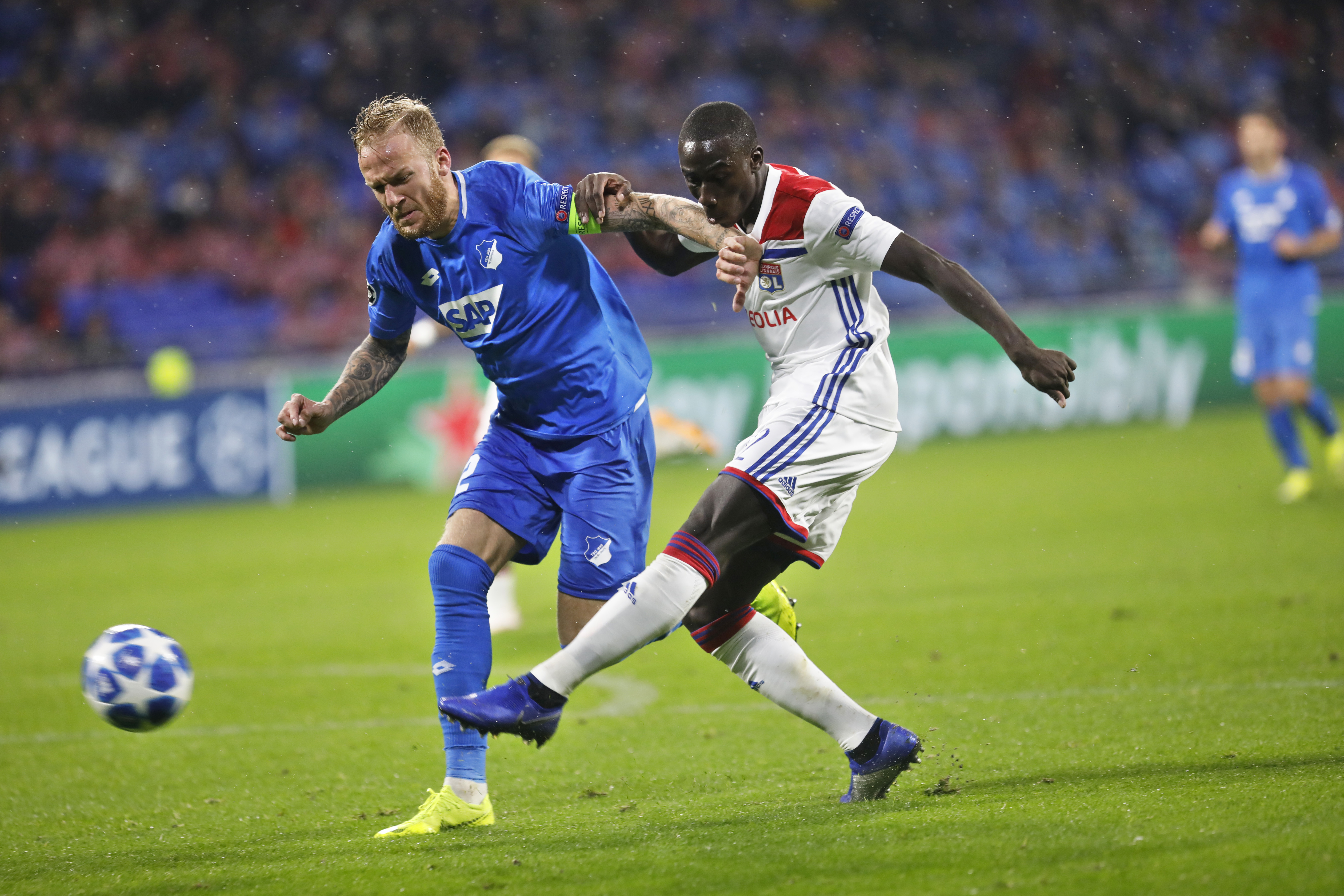 Lyon held to draw by 10-man Hoffenheim in Champions League