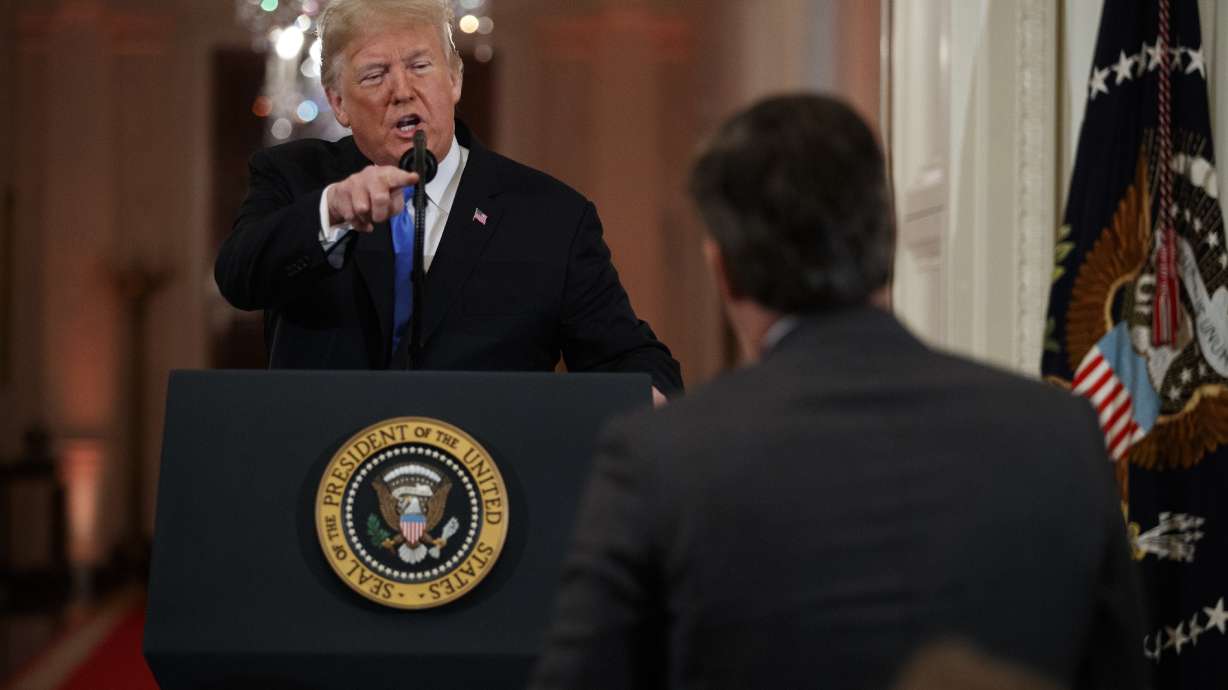The Latest: White House suspends pass of CNN's Acosta