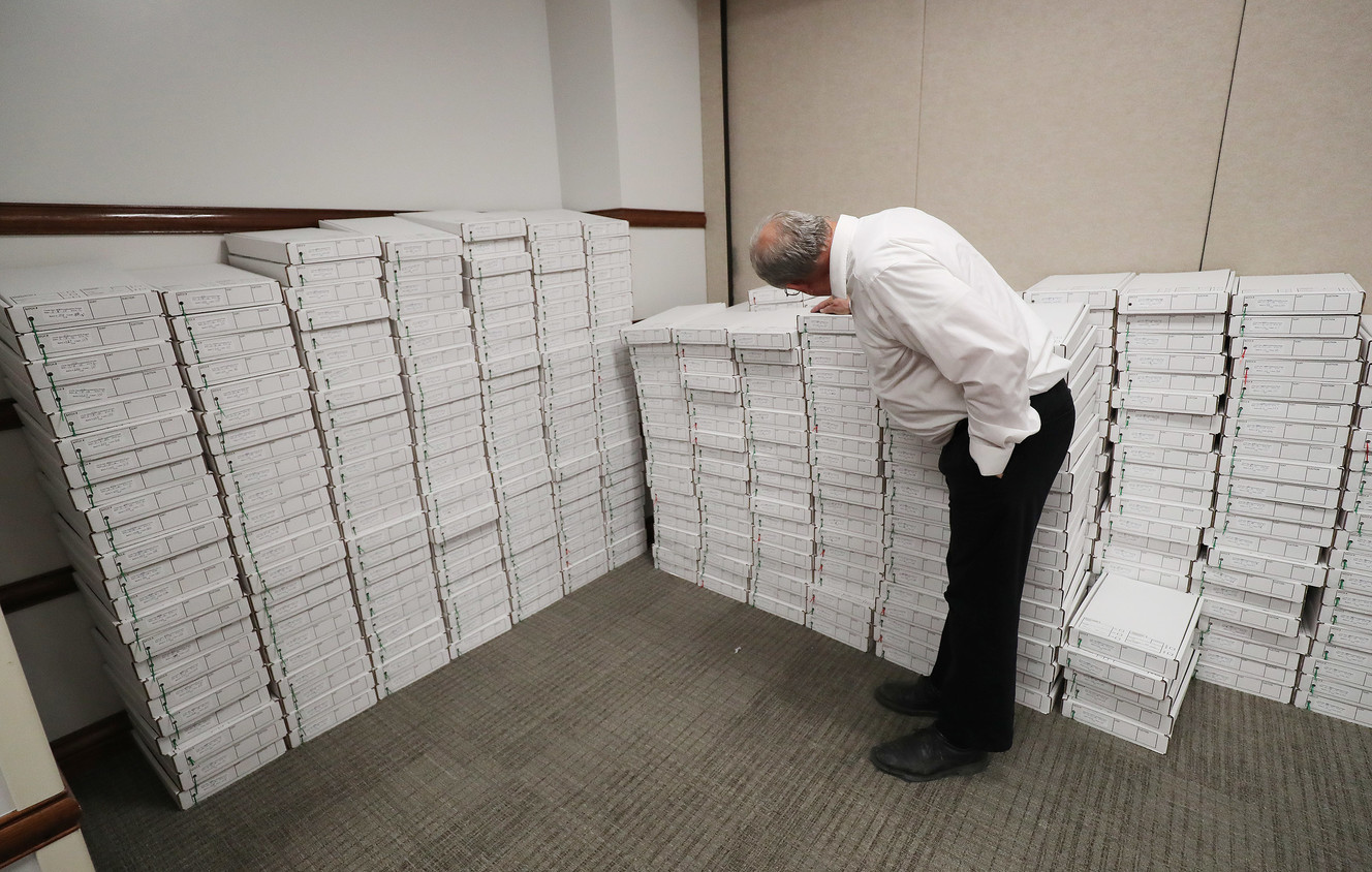 Alan Rollins looks over Utah County ballots that were sorted, sealed and stored in Provo on Wednesday, Nov. 7, 2018. (Photo: Jeffrey D. Allred, KSL)
