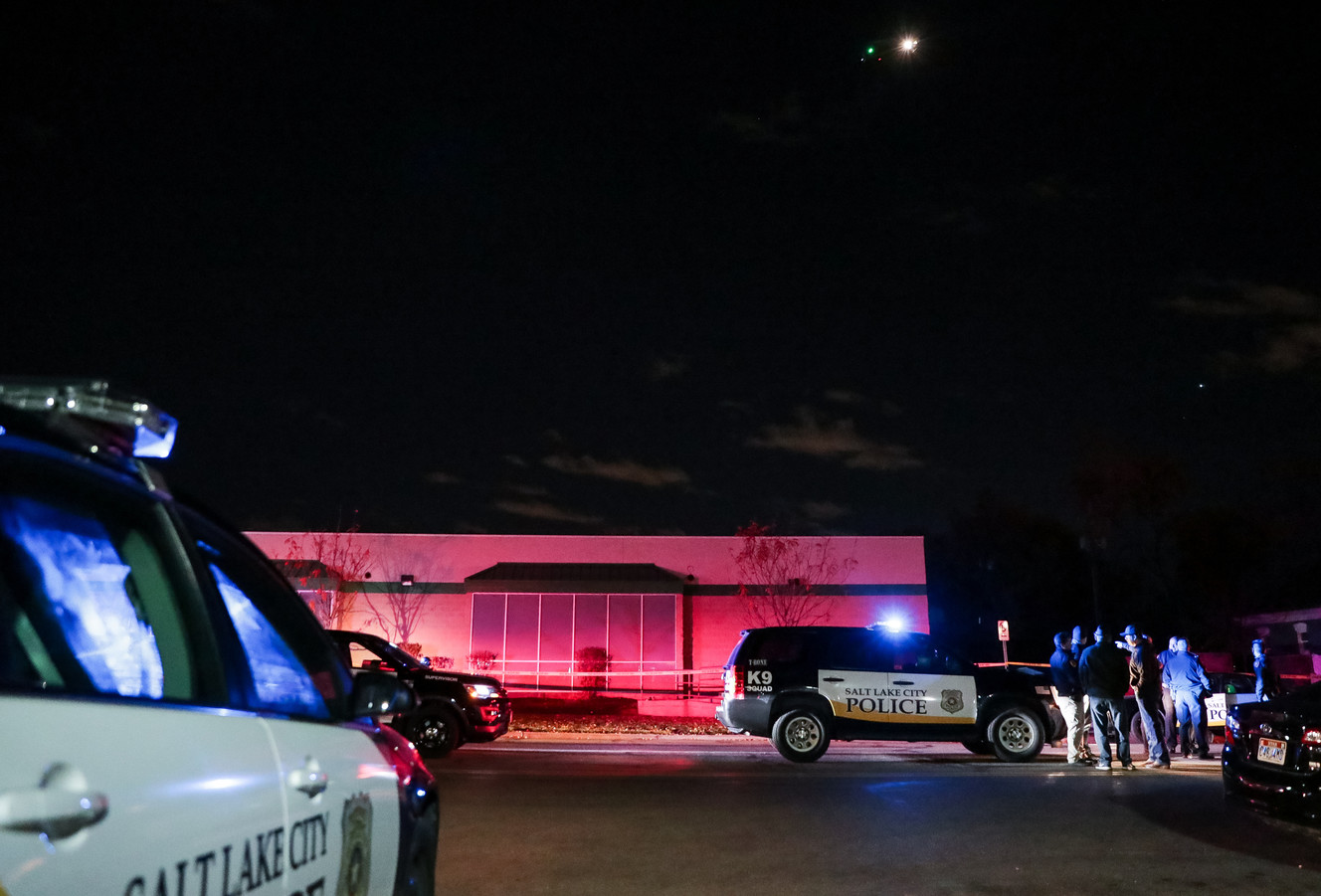 A police helicopter circles overhead as police work the scene of a stabbing that left a woman dead and another man critically injured at 477 N. 300 West in Salt Lake City on Nov. 7, 2018. Police arrested a man Monday in the killing.