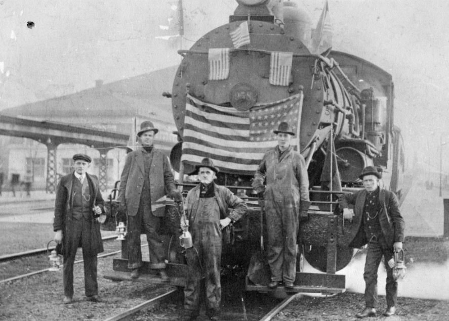 Railroad workers at the Denver & Rio Grande Railroad Depot celebrating the World War I armistice on Nov. 11, 1918. (Photo: Utah State History).