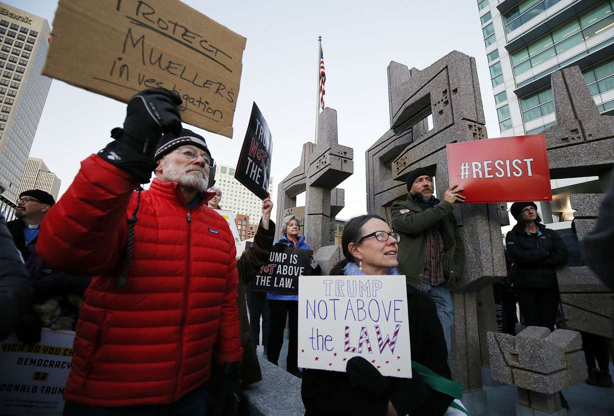 Kent Alderman and June Openshaw join others as they rally in Salt Lake City on Thursday, Nov. 8, 2018, following the resignation of Attorney General Jeff Sessions. (Photo: Ravell Call, KSL)