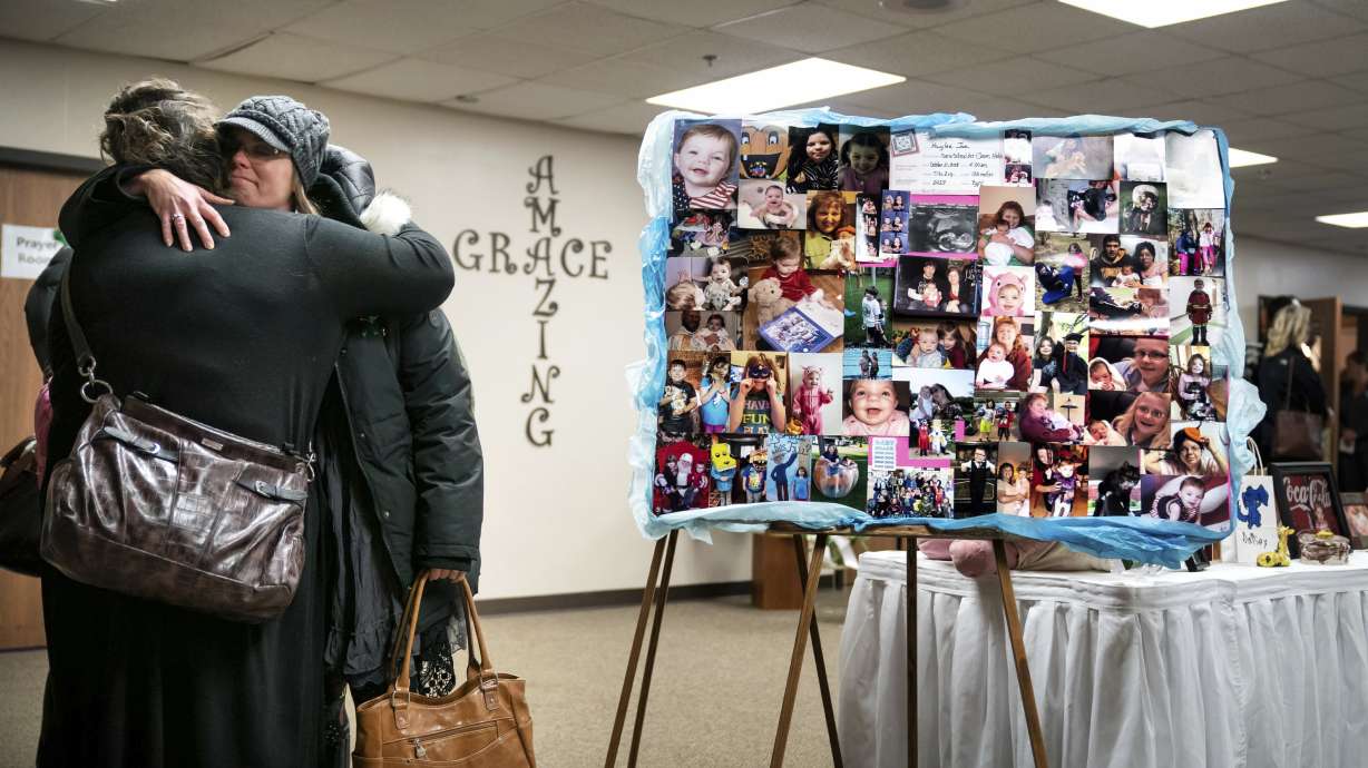 Mourners say goodbye to 3 Girl Scouts, mother
