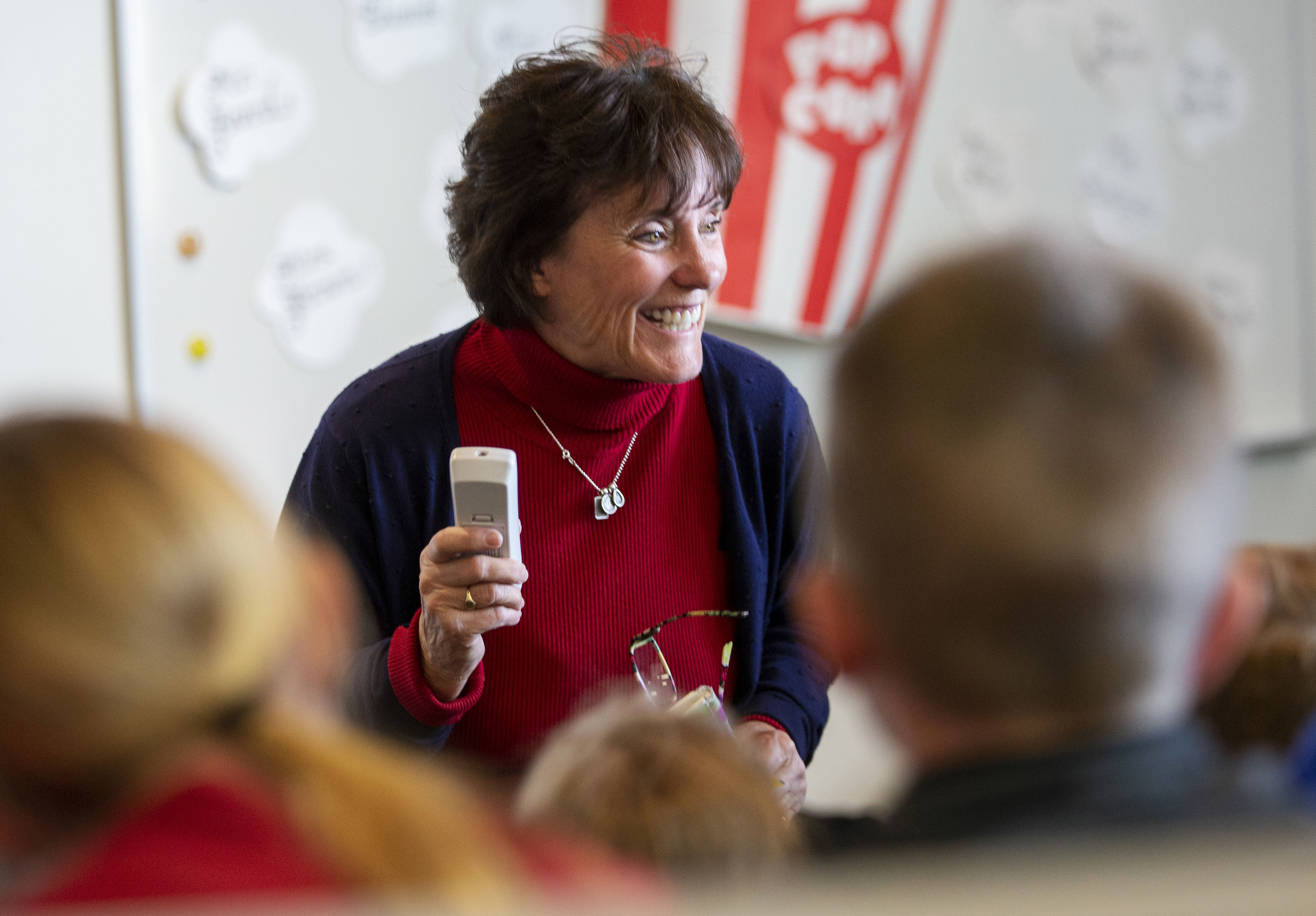 In this Monday, Oct. 29, 2018 photo, Librarian Kris Williams works with a class at Beaver School District's Belknap Elementary School in Beaver, Utah. The school is one of the highest performing elementary schools in Utah. (Scott G Winterton/The Deseret News via AP)