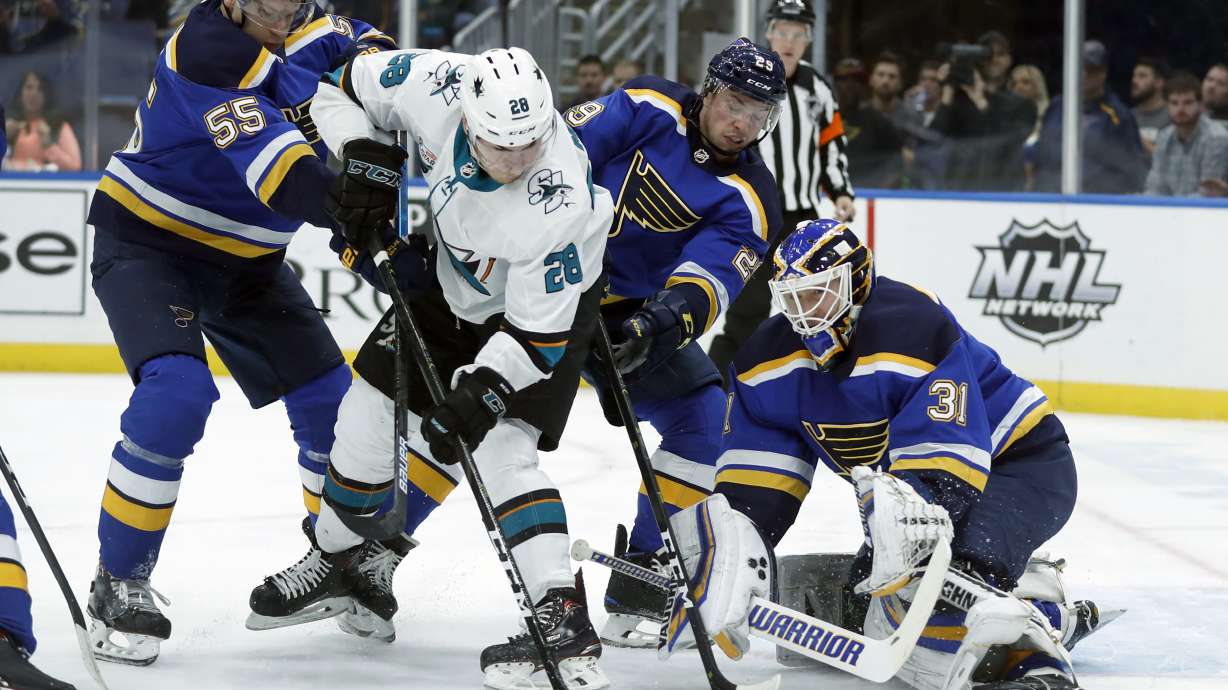 Chad Johnson makes 33 saves, Blues beat Sharks 4-0