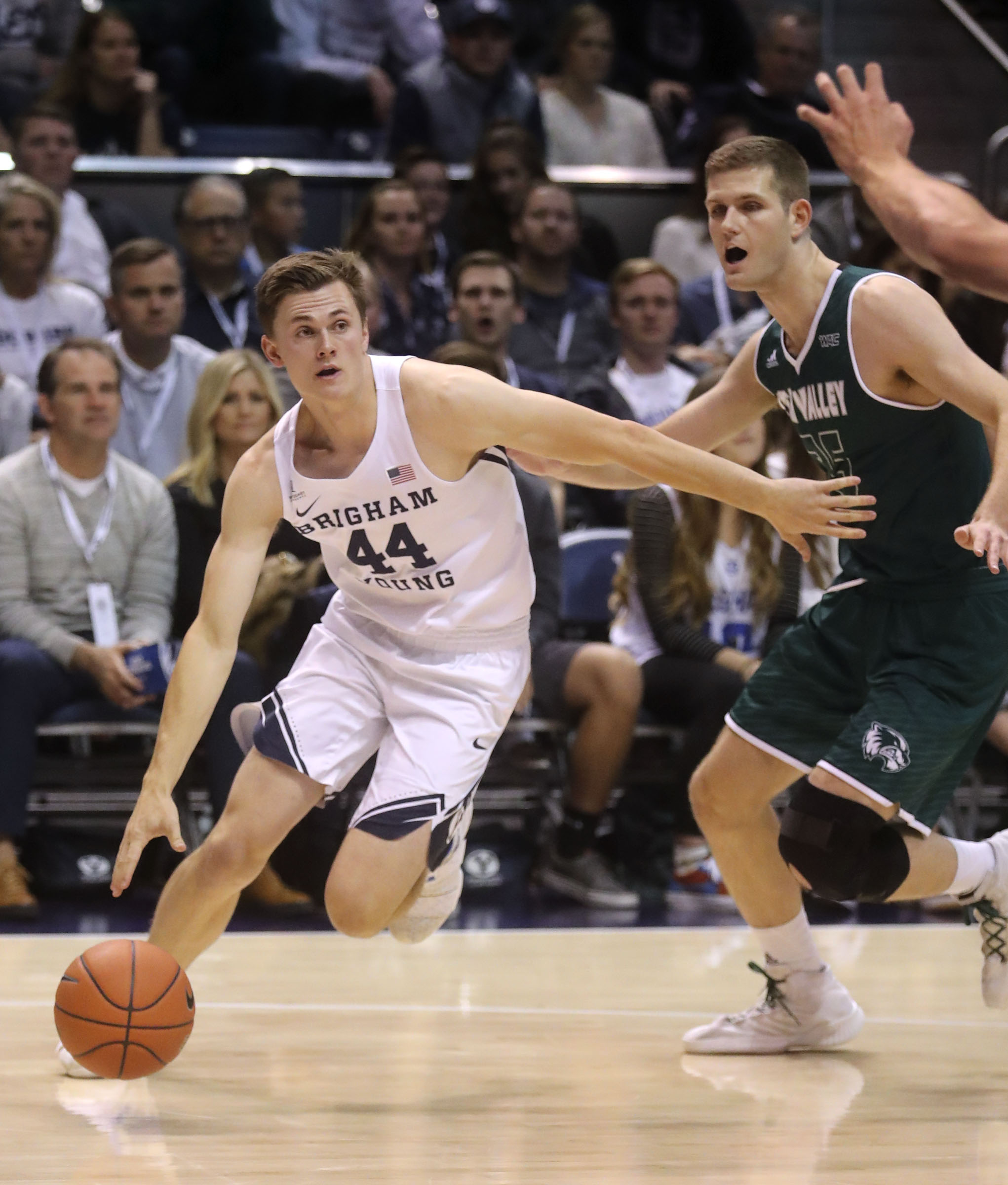 Brigham Young Cougars guard Connor Harding (44) dribbles the ball during a men's basketball game against Utah Valley University at the Marriott Center in Provo on Friday, Nov. 9, 2018. (Photo: Kristin Murphy, KSL)