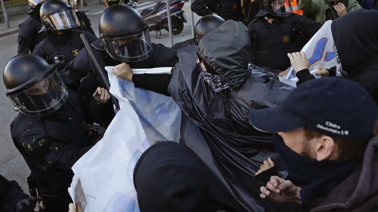 Police clash with Catalan separatists in Barcelona
