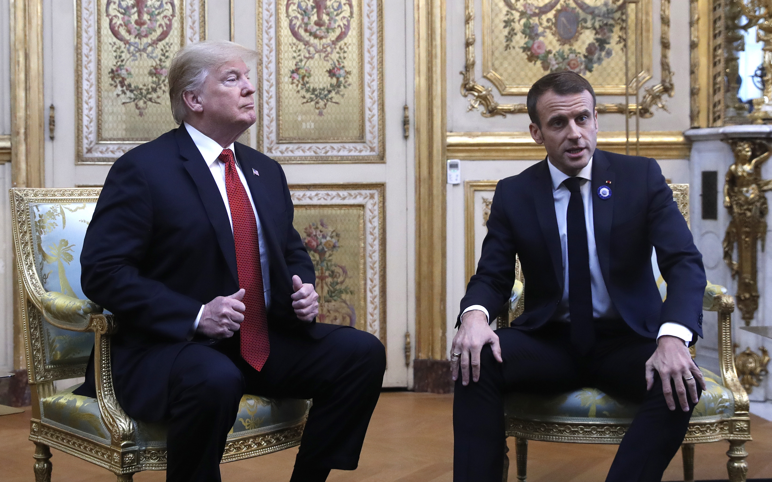After testy tweet, Trump calls French president good friend