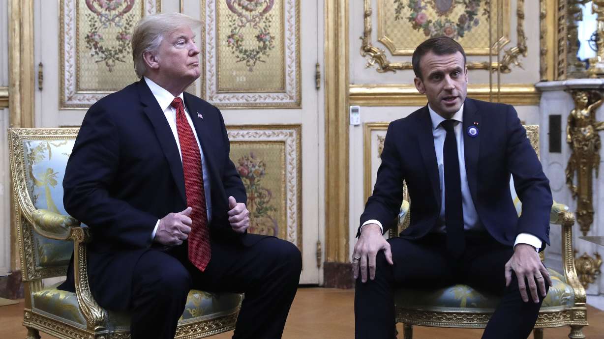 After testy tweet, Trump calls French president good friend