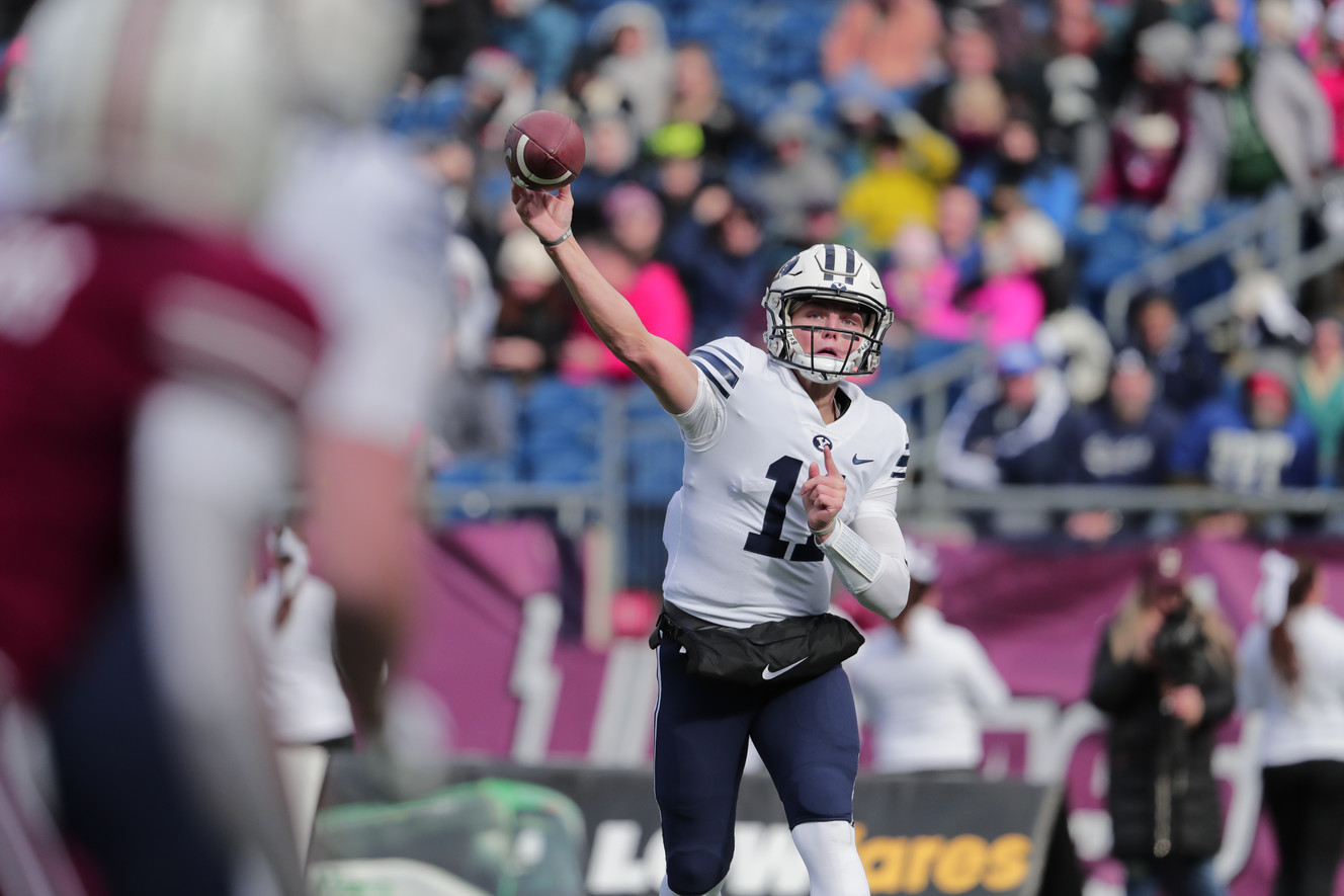 Quarterback Zach Wilson throws a pass for BYU against UMass, Saturday, Nov. 10, 2018 in Foxborough, Massachussetts. (Photo: Jaren Wilkey, BYU Photo)