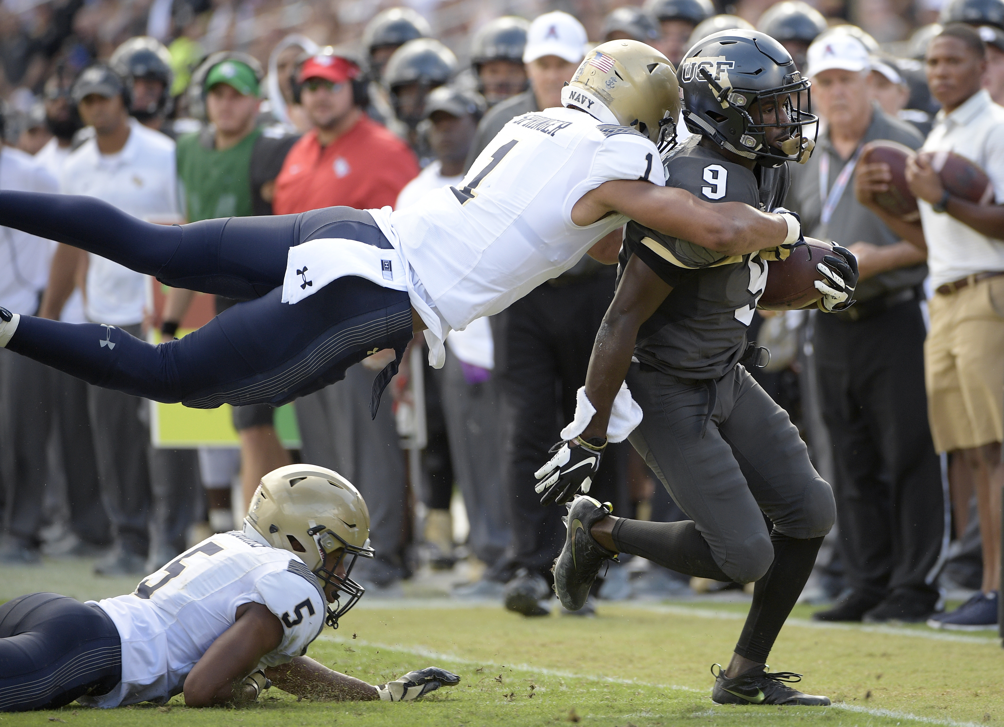 Milton accounts for 3 TDs, No. 11 UCF beats Navy 35-24