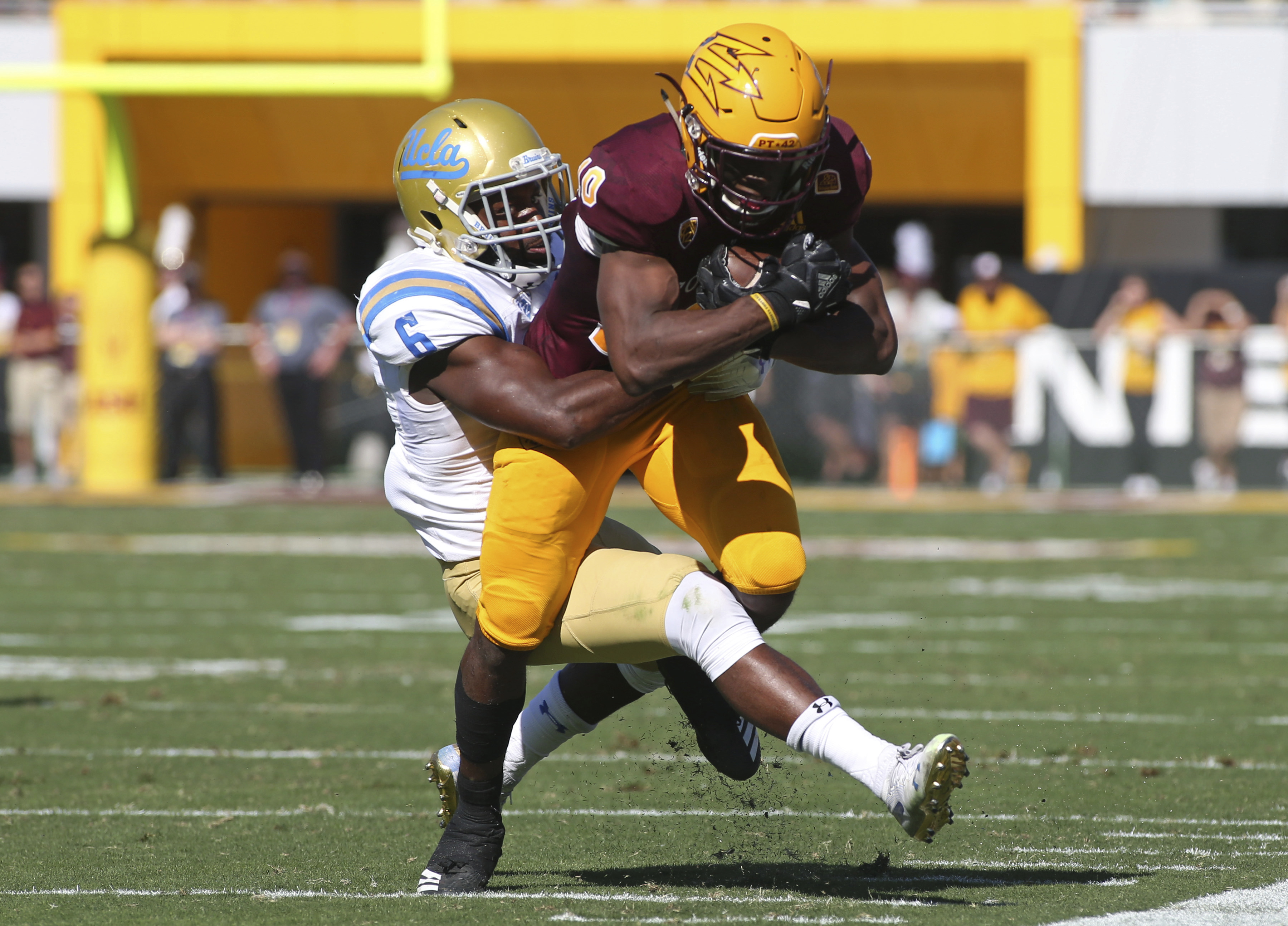 Wilkins, Benjamin lead Sun Devils past Bruins