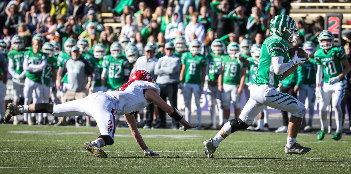 South Summit's Jared Dansie (8) runs the ball during the 2A football championship game against Grand County High School at Stewart Stadium in Ogden on Saturday, Nov. 10, 2018. (Photo: Qiling Wang for KSL)