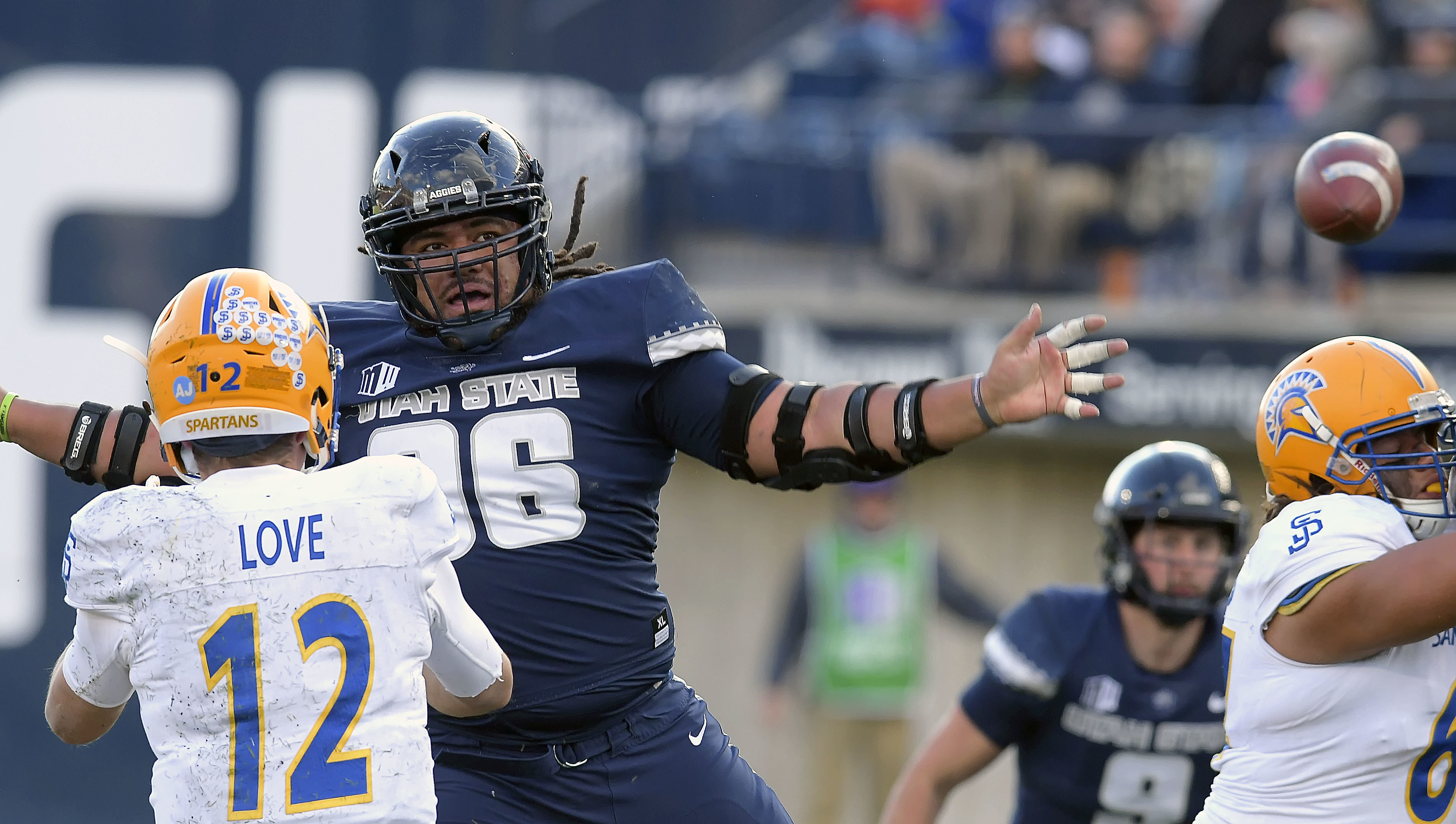San Jose State quarterback Josh Love (12) throws a pass as Utah State nose tackle Christopher 'Unga (96) defends during an NCAA football game Saturday, Nov. 10, 2018, in Logan, Utah. (Photo: Eli Lucero, The Herald Journal via AP)