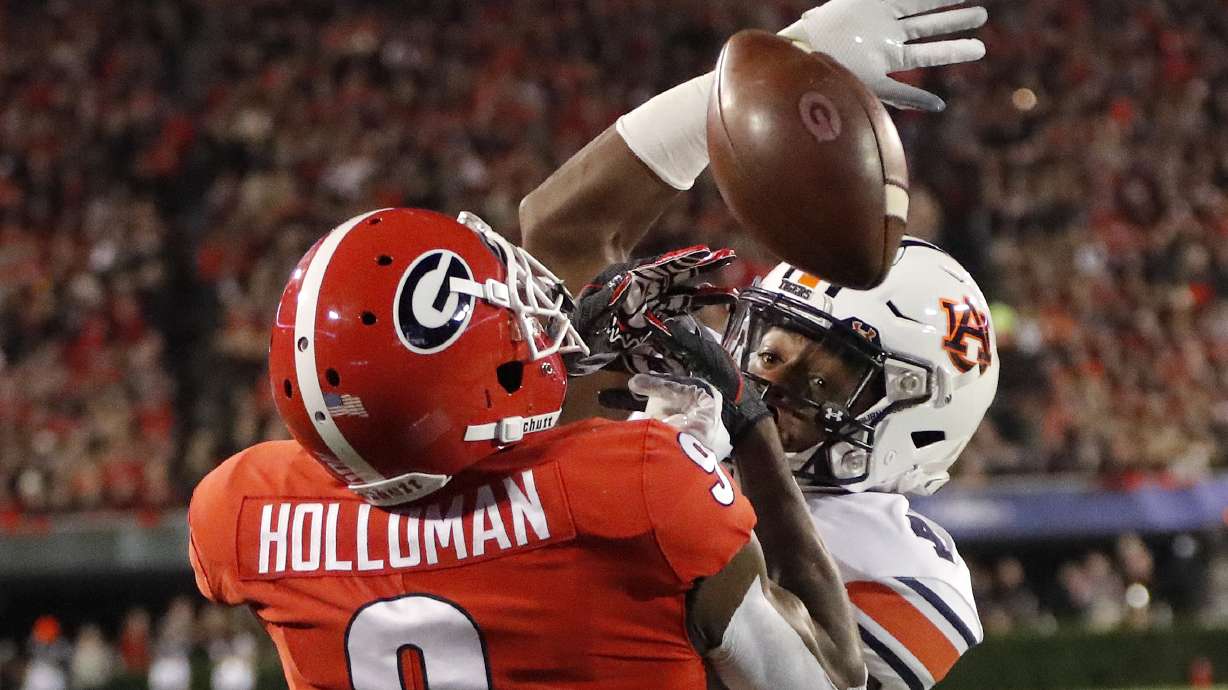 Swift runs for 186 yards, No. 5 Georgia beats Auburn 27-10