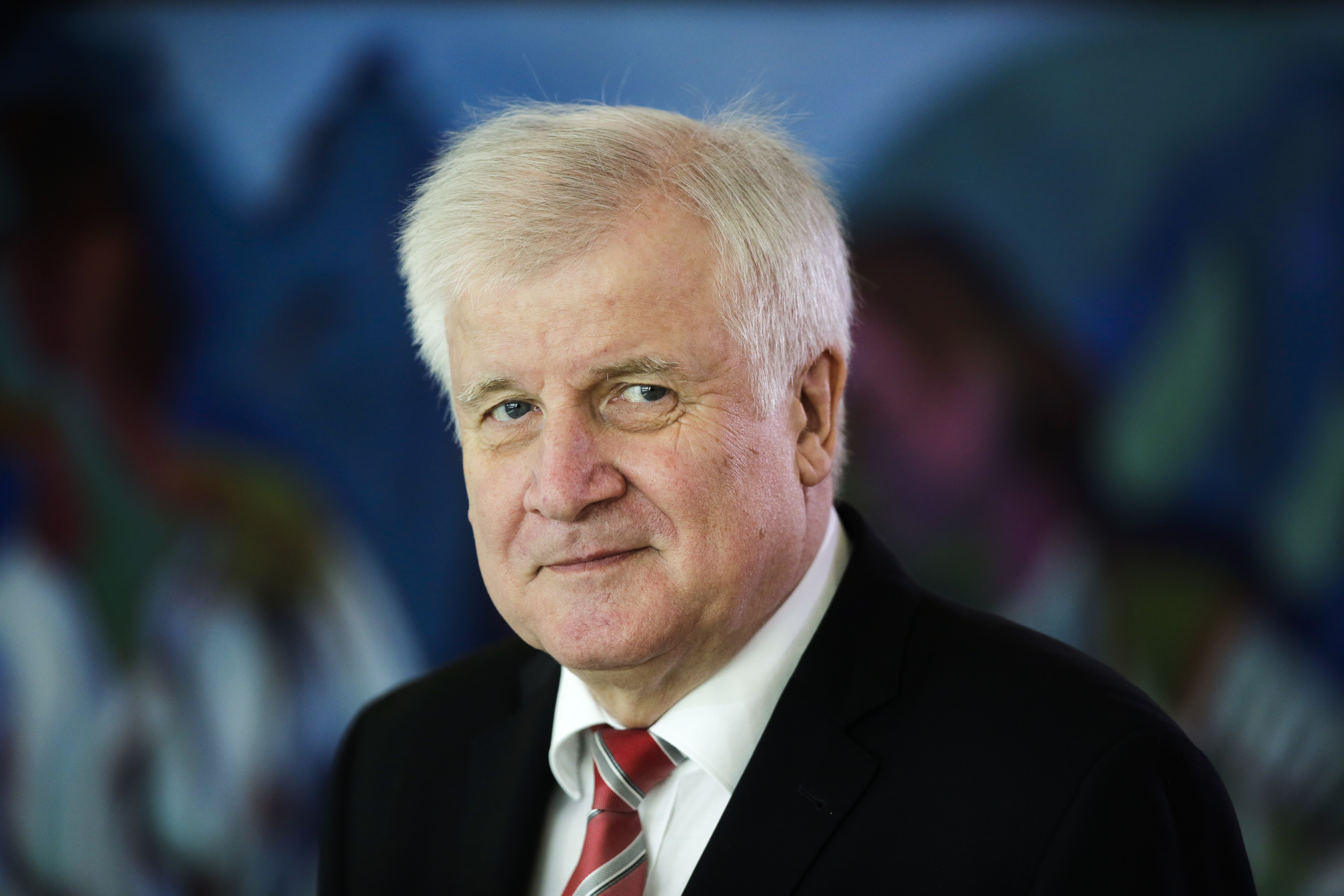 The Latest: Germany's Seehofer to remain interior minister