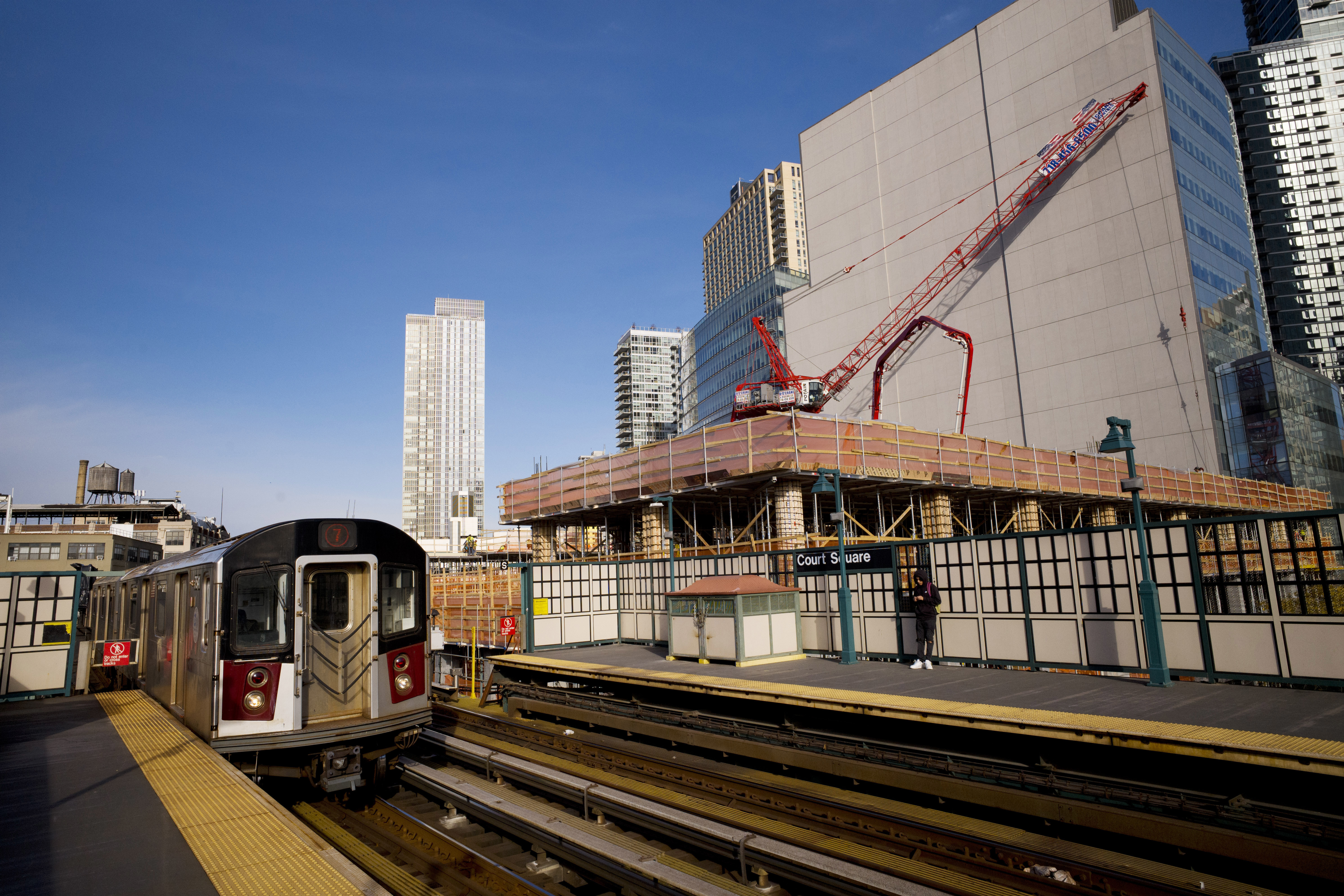 In this Wednesday, Nov. 7, 2018, photo, a construction crane is perched on the site of Court Square City View Tower adjacent to the Court Square Number 7 subway station in Long Island City in the Queens borough of New York. Photo: AP Photo