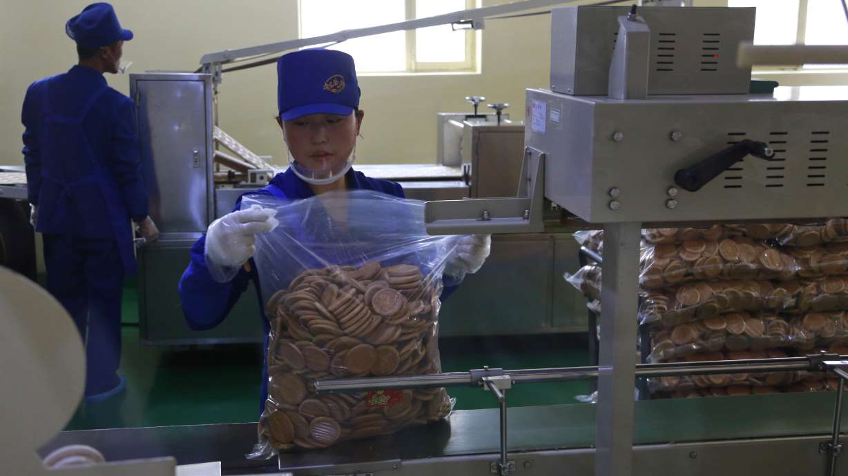 In factory after factory, Kim tries to grow N. Korea economy