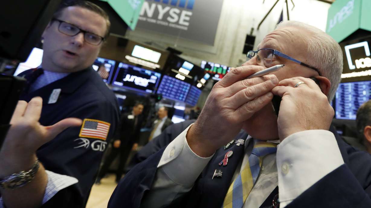 Asian shares lower after Wall Street falls over oil concerns