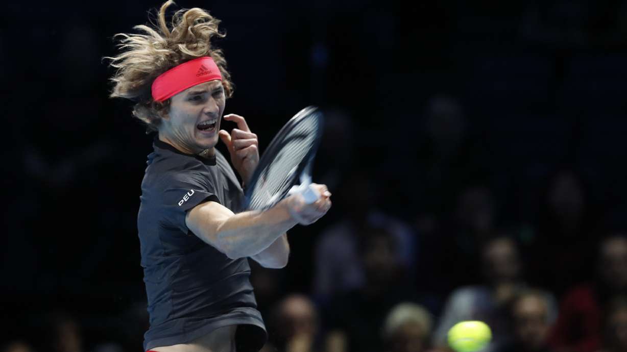 Djokovic overcomes illness to progress at ATP Finals