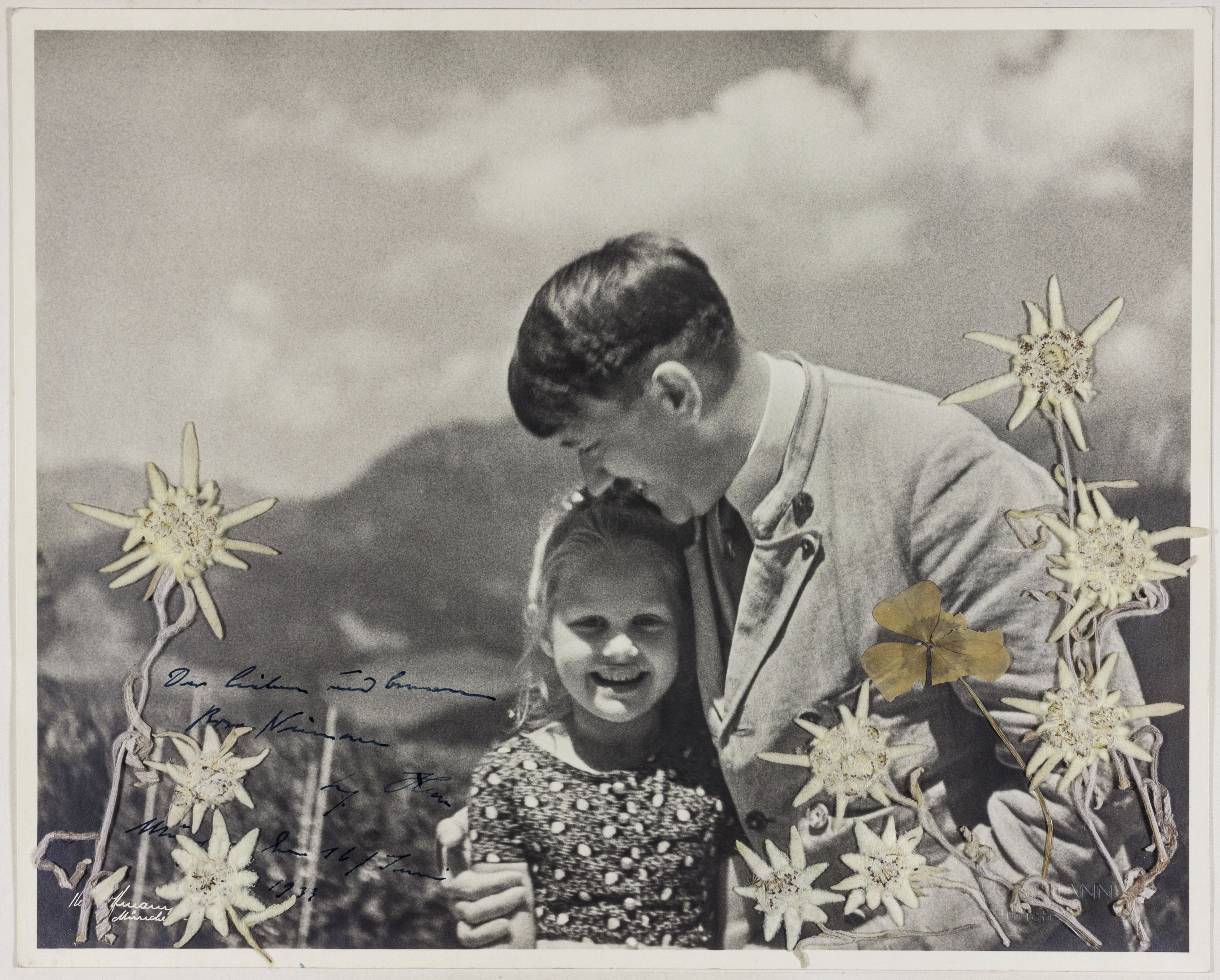 Photo of Hitler embracing child of Jewish grandmother sold