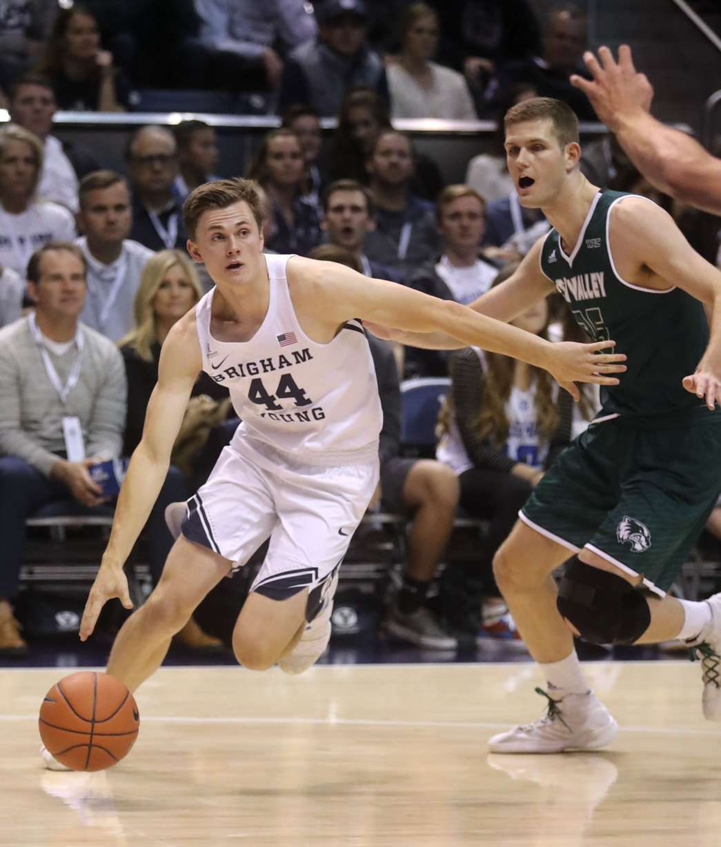 BYU guard Connor Harding (44) dribbles the ball during a men's basketball game against Utah Valley University at the Marriott Center in Provo on Friday, Nov. 9, 2018. (Photo: Kristin Murphy, Deseret News)