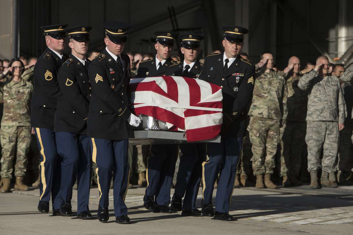 Members of the Utah National Guard honor guard detail carry a Maj. Brent R. Taylor's casket at Roland R. Wright Air National Guard Base in Salt Lake City on Wednesday, Nov. 14, 2018. Taylor, 39, of North Ogden, died Nov. 3, 2018, in Afghanistan of wounds sustained from small arms fire. His funeral is scheduled for Saturday, Nov. 17, in Ogden. (Photo: Matt Herp)
