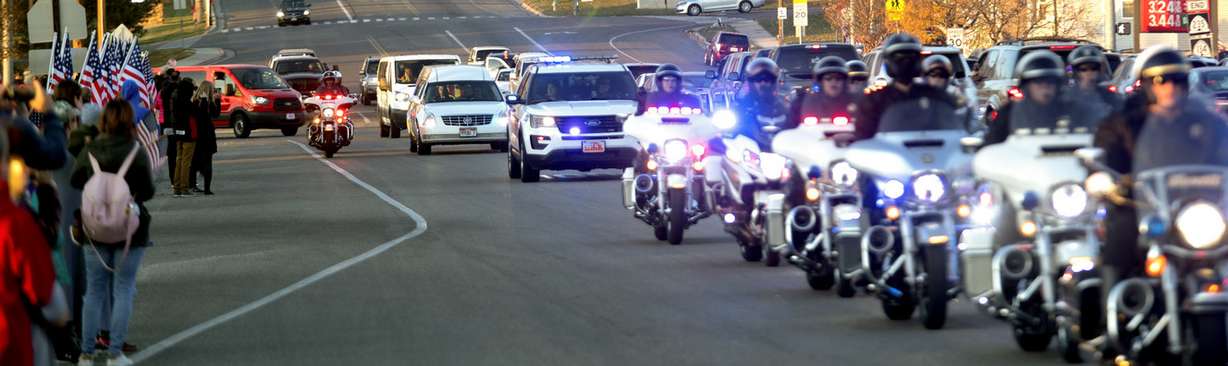 People line Washington Blvd. as the body of Maj. Brent Taylor, the North Ogden mayor killed while serving in Afghanistan, is escorted through North Ogden on Wednesday, Nov. 14, 2018. (Photo: Steve Griffin, KSL)