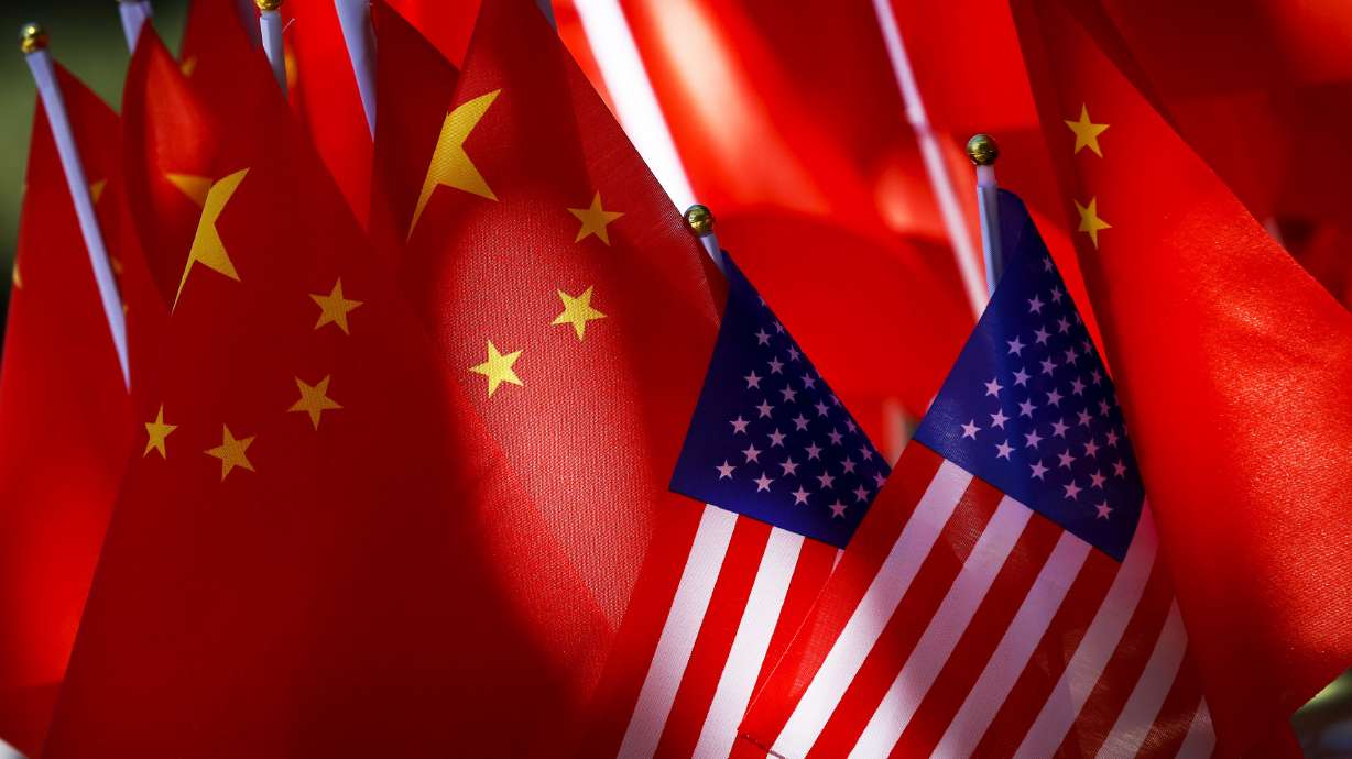 China says talks with US on trade battle have resumed