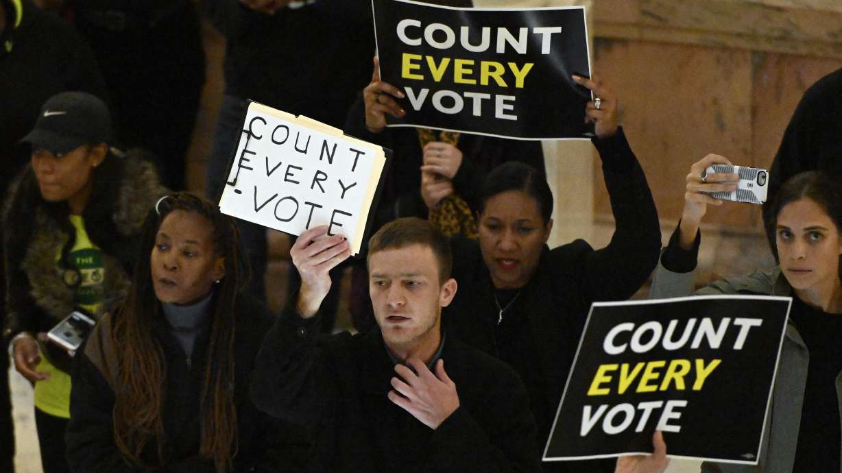 The Latest: AP won't declare winner in Georgia gov. race