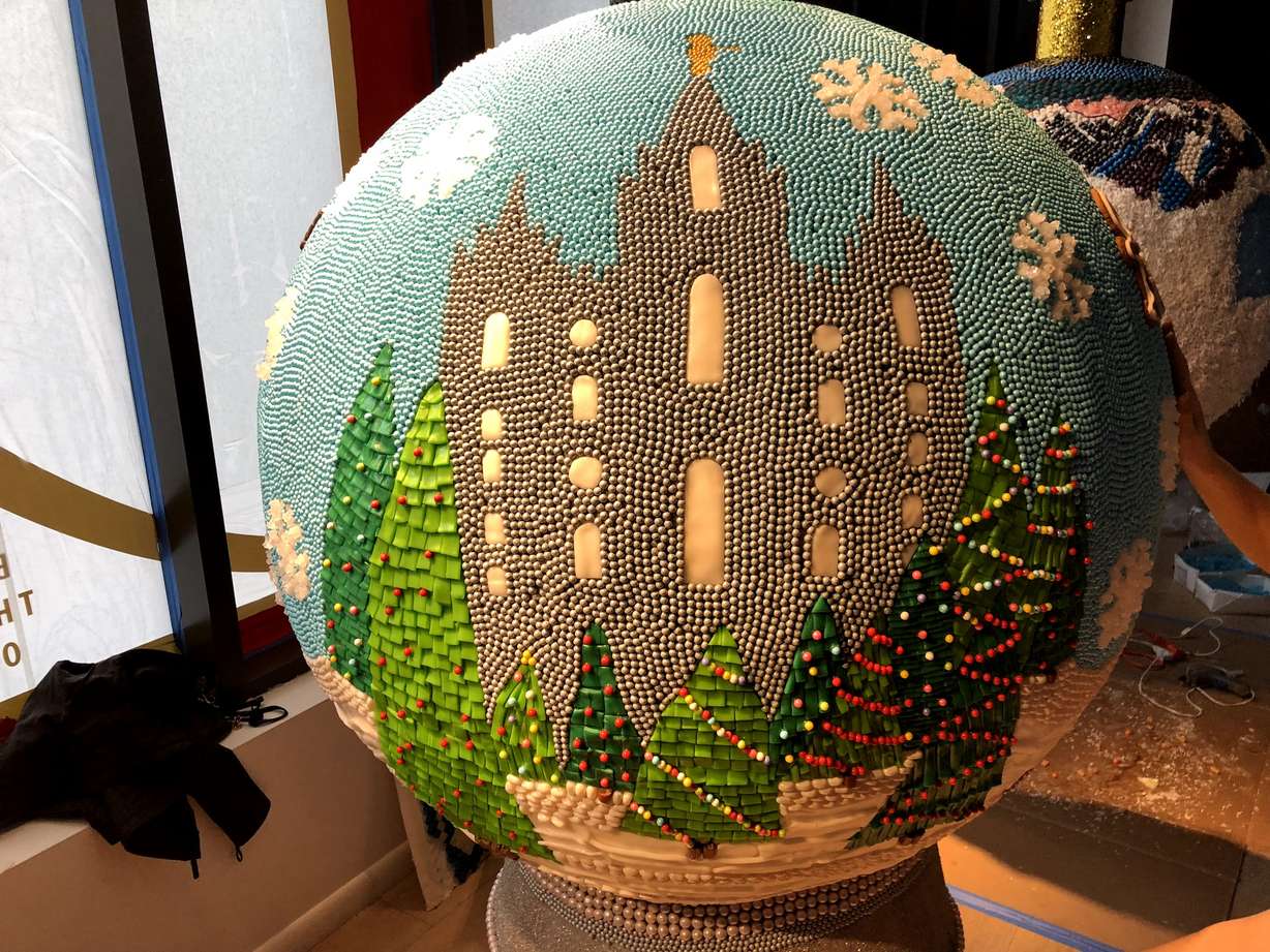 Artist Holly Jones designed a candy ornament that features familiar holiday traditions like visiting the lights at Temple Square. (Photo: Mary Dalrymple, KSL.com)