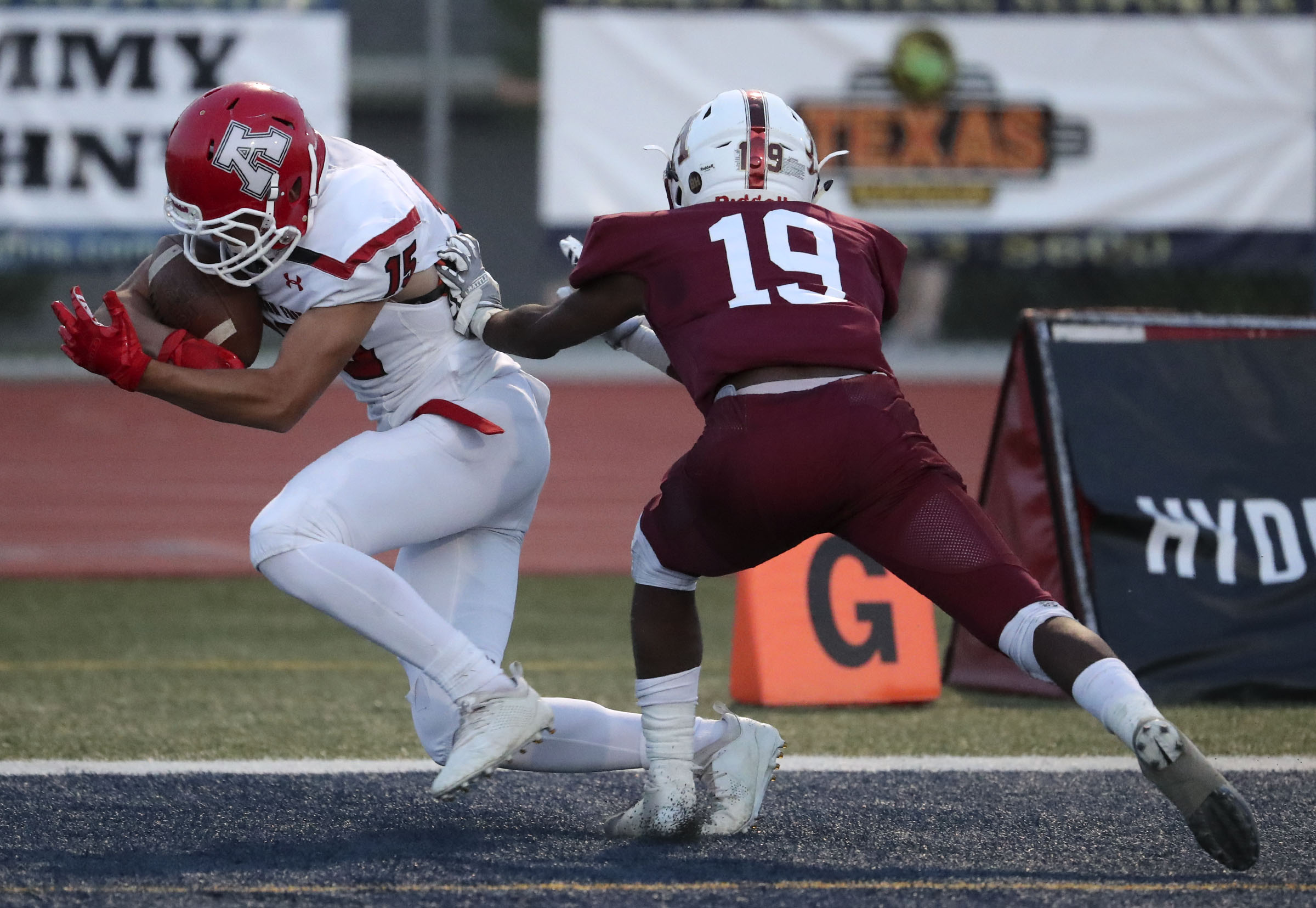 American Fork's Devin Downing scores a touchdown as Herriman's Nate Allen tackles him during a football game at Herriman High School in Herriman on Thursday, Sept. 6, 2018. (Photo: Kristin Murphy, Deseret News)