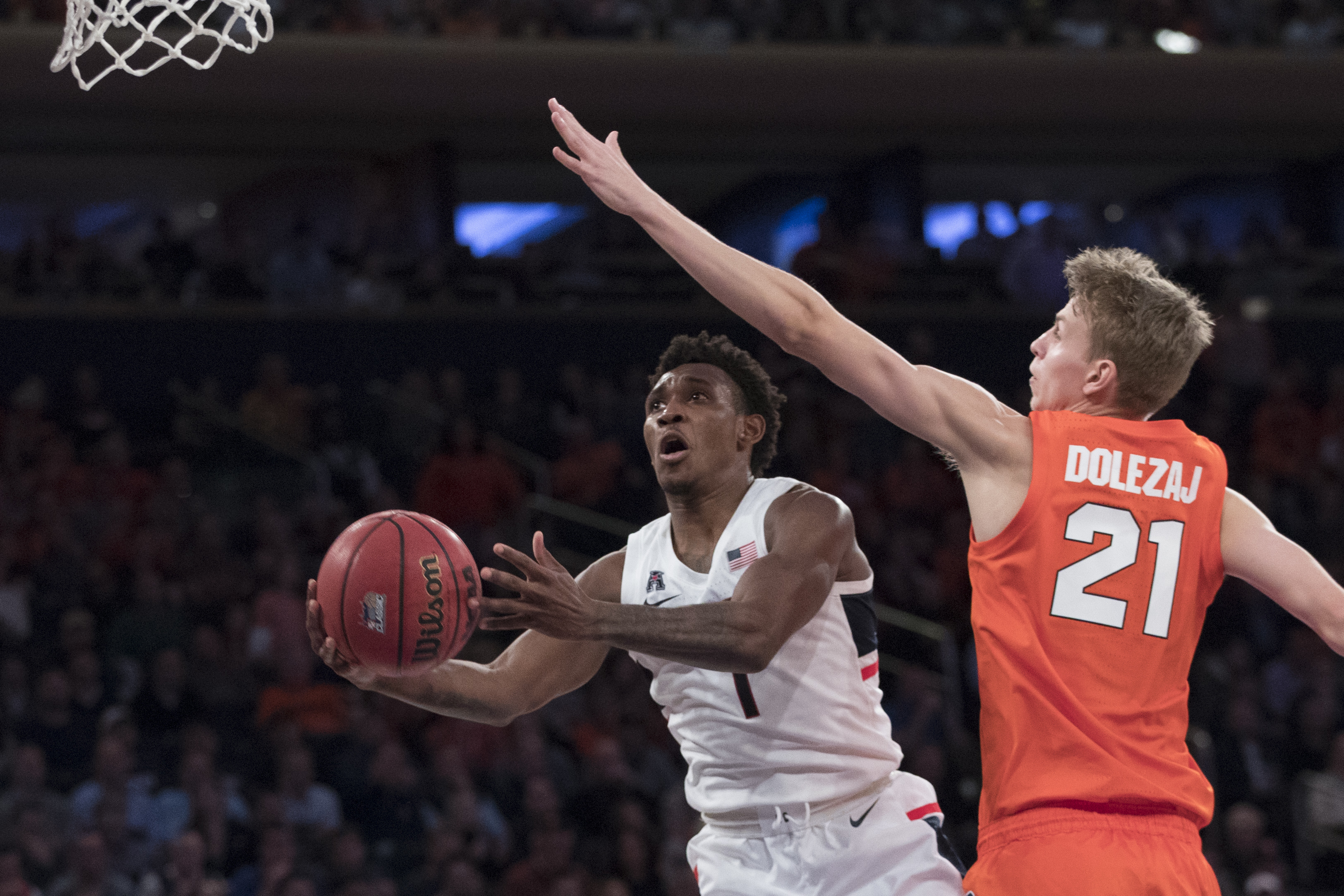 Iowa and UConn upset ranked foes Oregon and Syracuse