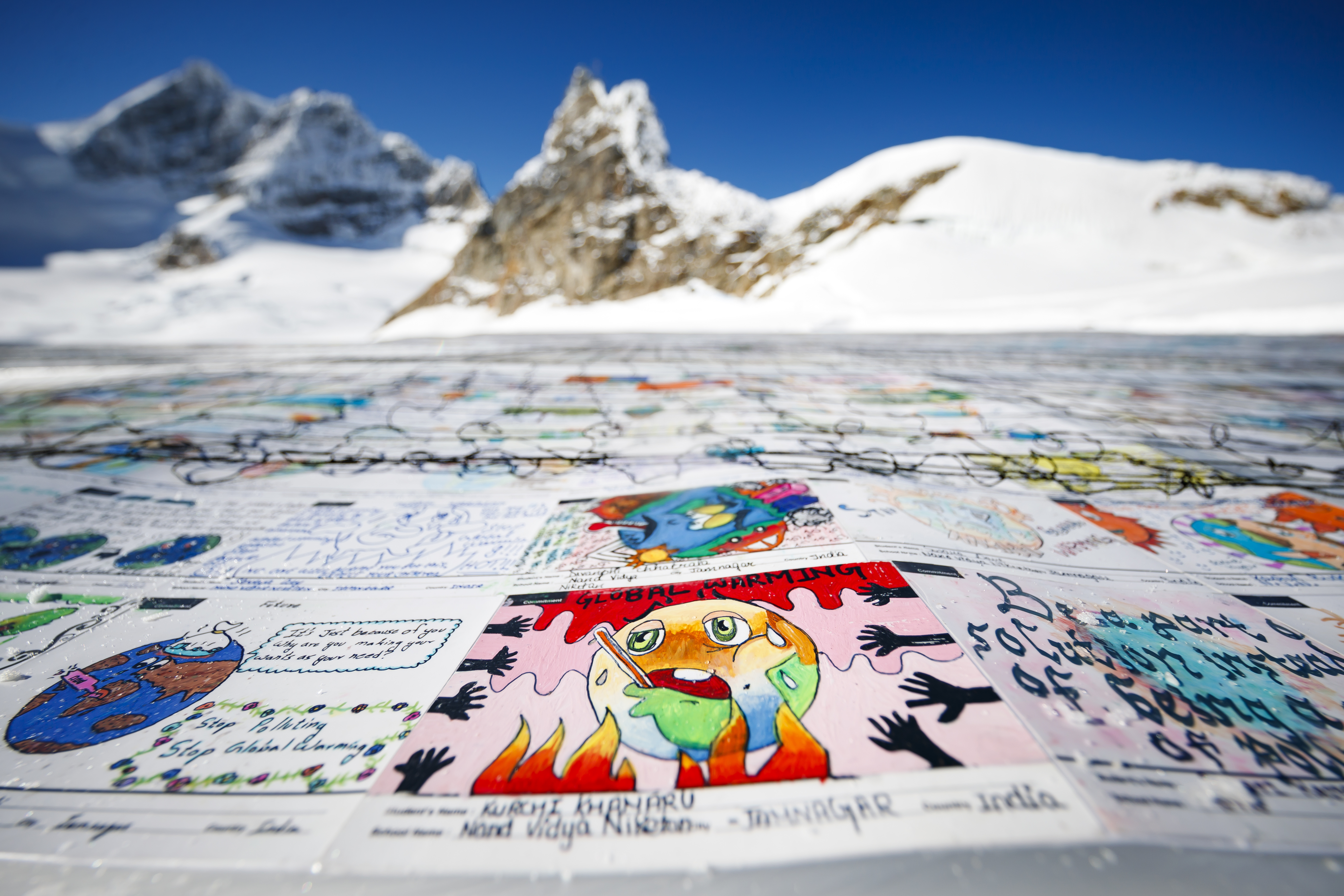 Kids' postcards blanket Alpine glacier in eco-friendly stunt
