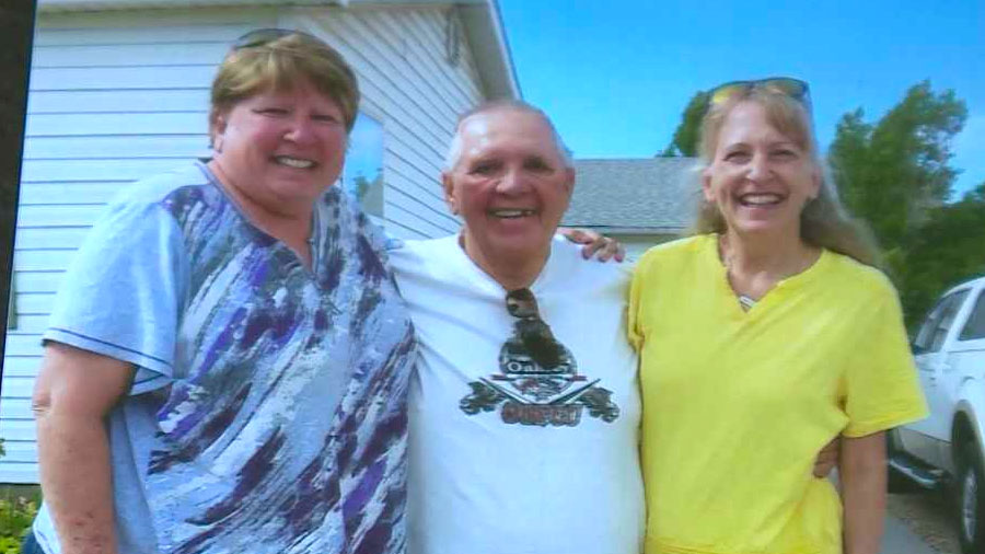 Carlene Tuft (left) and JanaLe Fox (right) after reuniting with biological brother, Dave Pedockie (center). (Family photo)