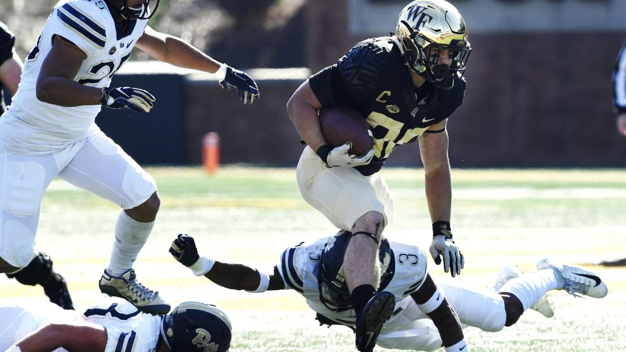 Pitt clinches 1st ACC title game berth by beating Wake 34-13