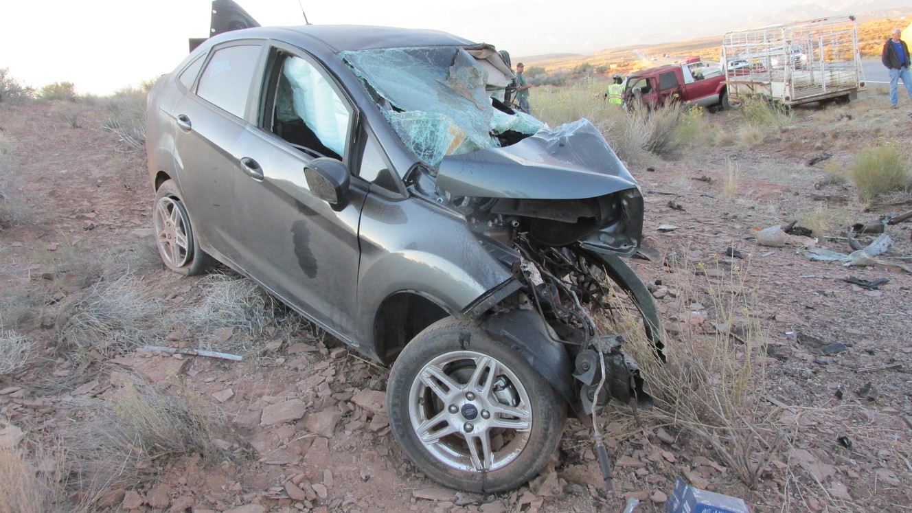 One dead in head-on crash between truck, car