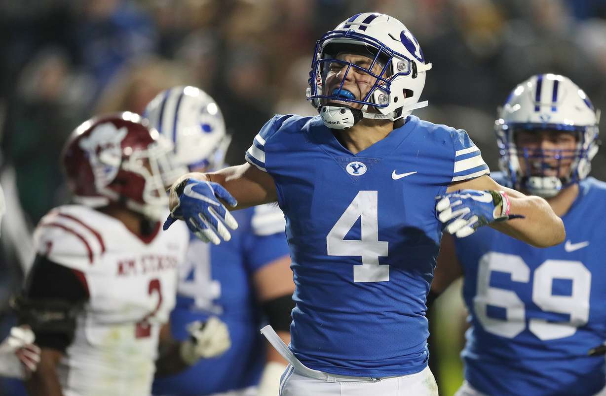 Brigham Young Cougars running back Lopini Katoa (4) celebrates his touchdown against the New Mexico State Aggies in Provo on Saturday, Nov. 17, 2018. (Photo: Jeffrey D. Allred, Deseret News)
