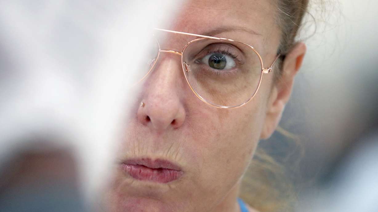 The Latest: Embattled Florida elections official to resign