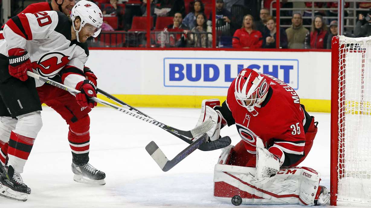 Hurricanes score twice in opening 30 seconds, top Devils 2-1